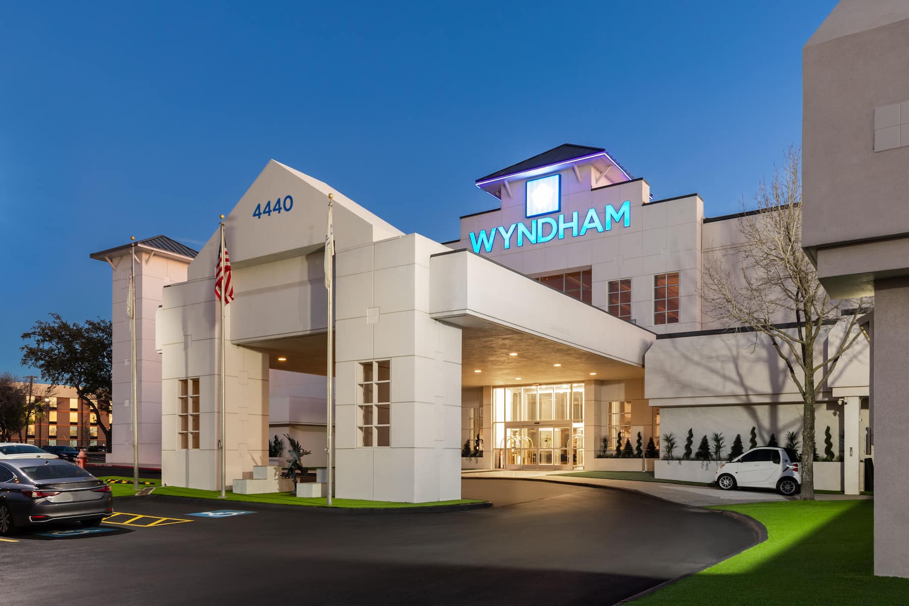 Exterior Dusk Image of Wyndham DFW Airport hotel in Irving, Texas