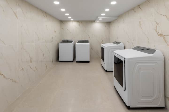 Laundry facilities at Wyndham DFW Airport in Irving, Texas
