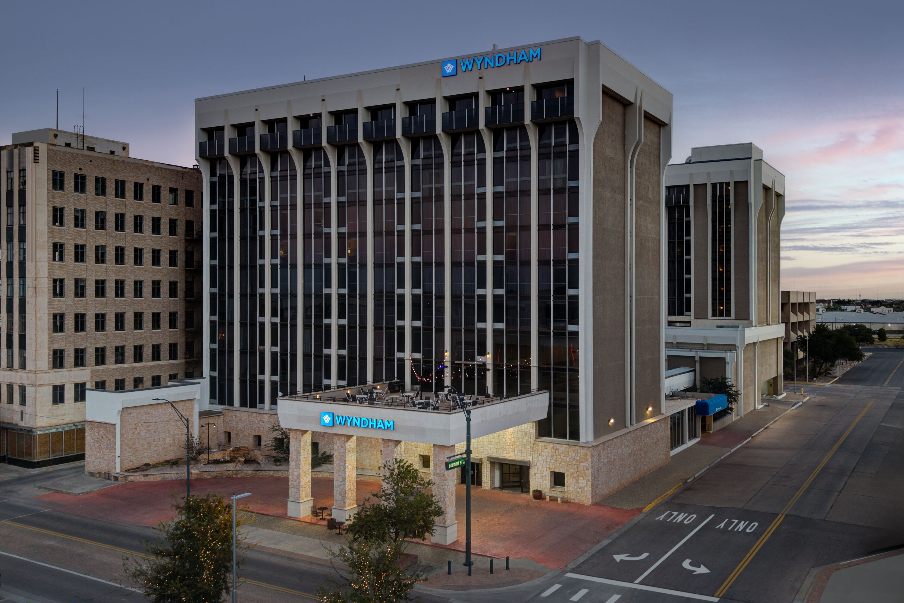 Exterior Dusk Image of Wyndham Midland Downtown hotel in Midland, Texas