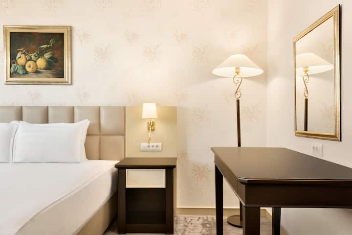 King bed guest room at the Wyndham Tashkent in Tashkent, Other than US/Canada