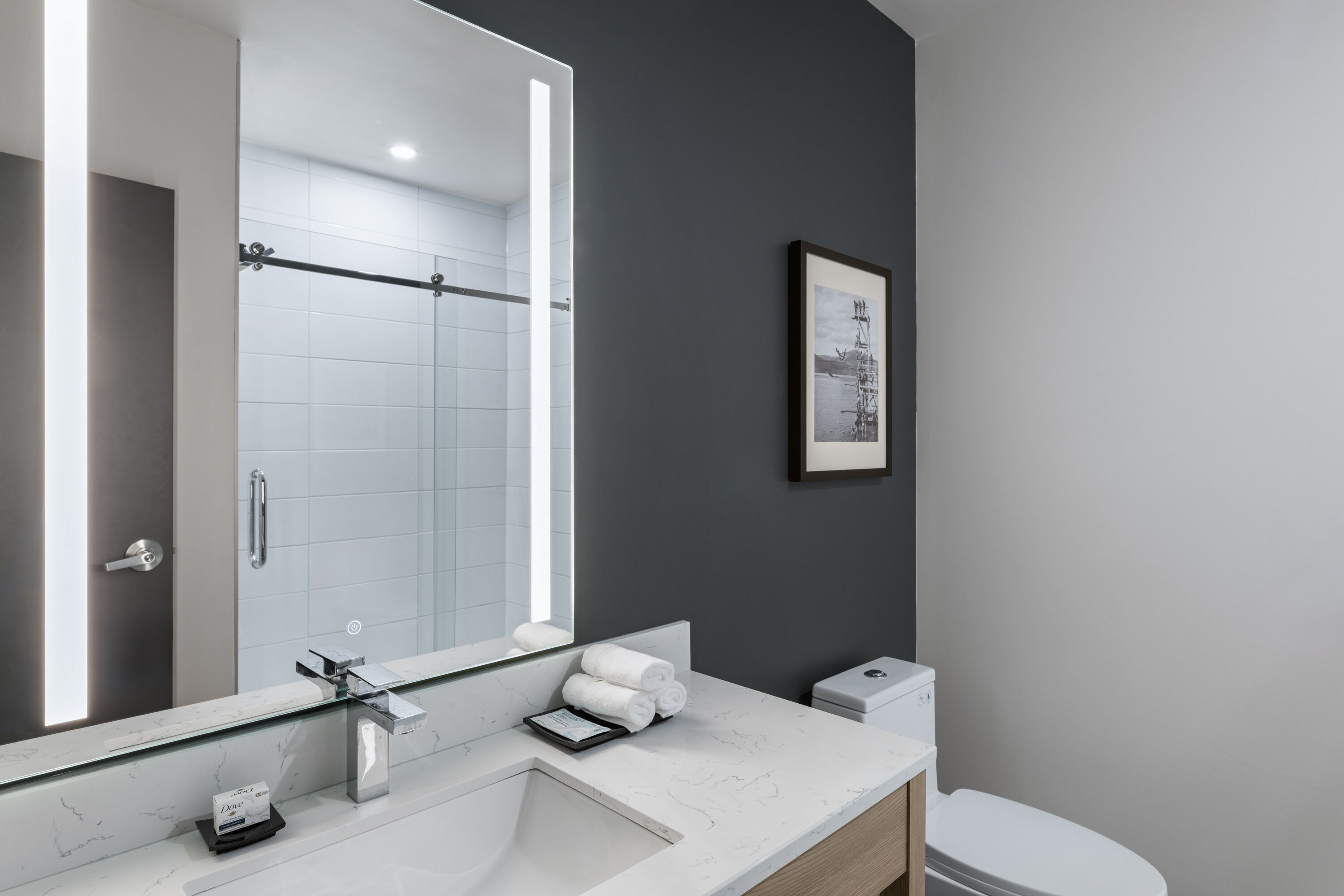 Guest room bath at the La Quinta Inn & Suites by Wyndham Kelowna BC in Kelowna, British Columbia