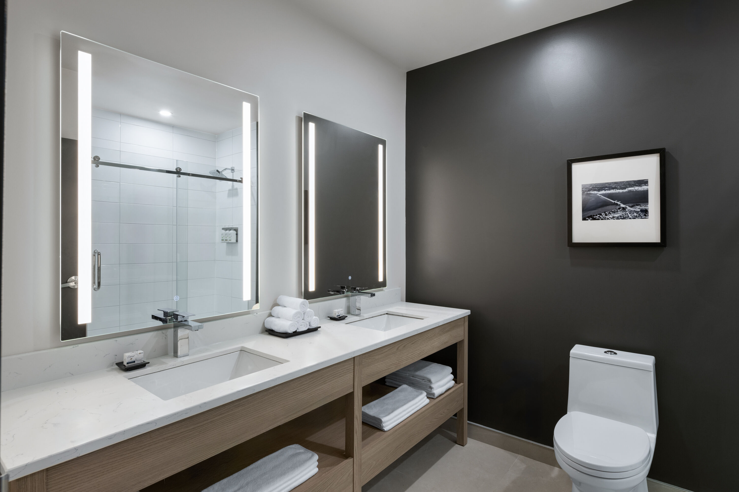 Guest room bath at the La Quinta Inn & Suites by Wyndham Kelowna BC in Kelowna, British Columbia