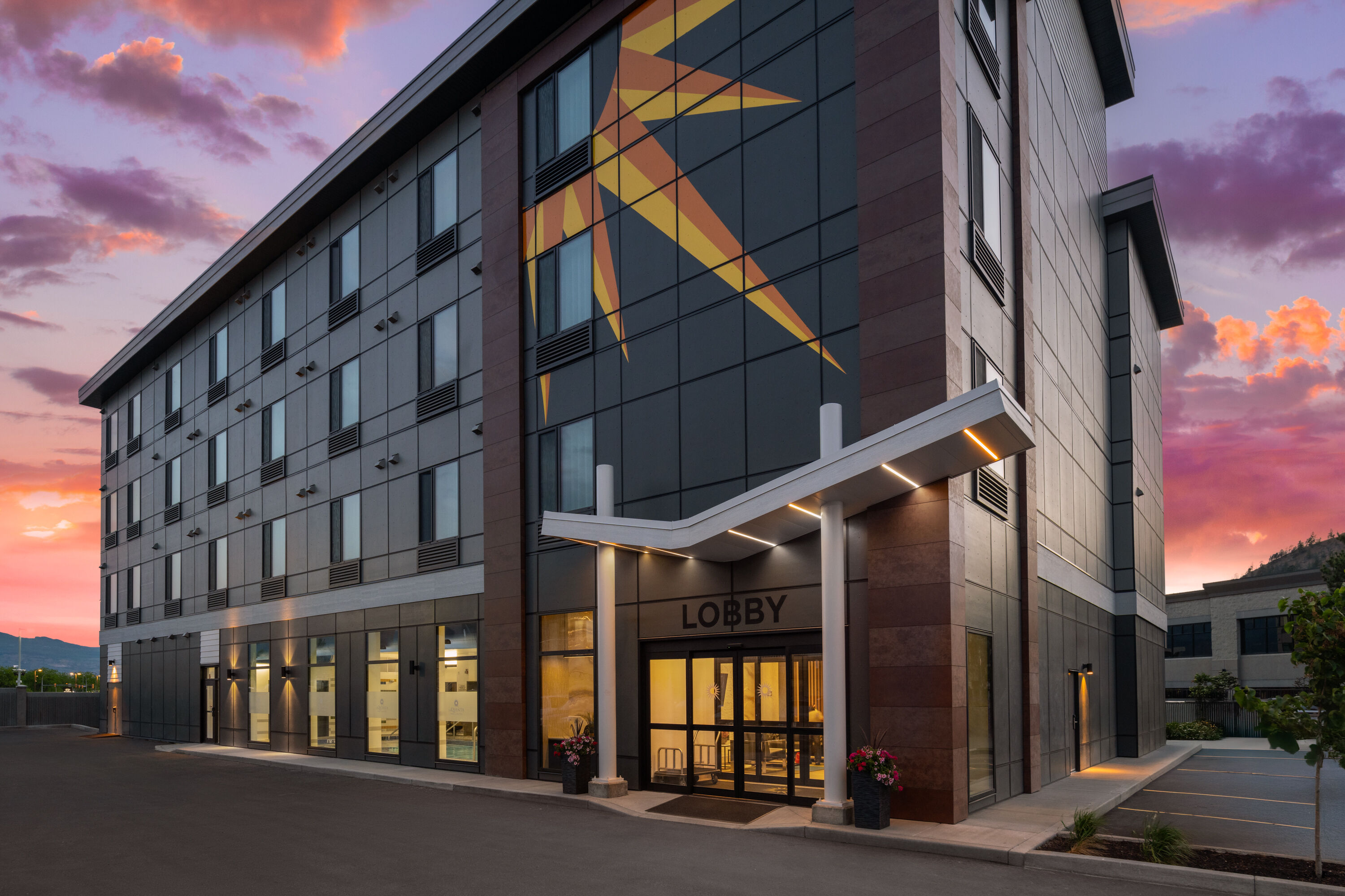 Exterior Dusk Image of La Quinta Inn & Suites by Wyndham Kelowna BC hotel in Kelowna, British Columbia