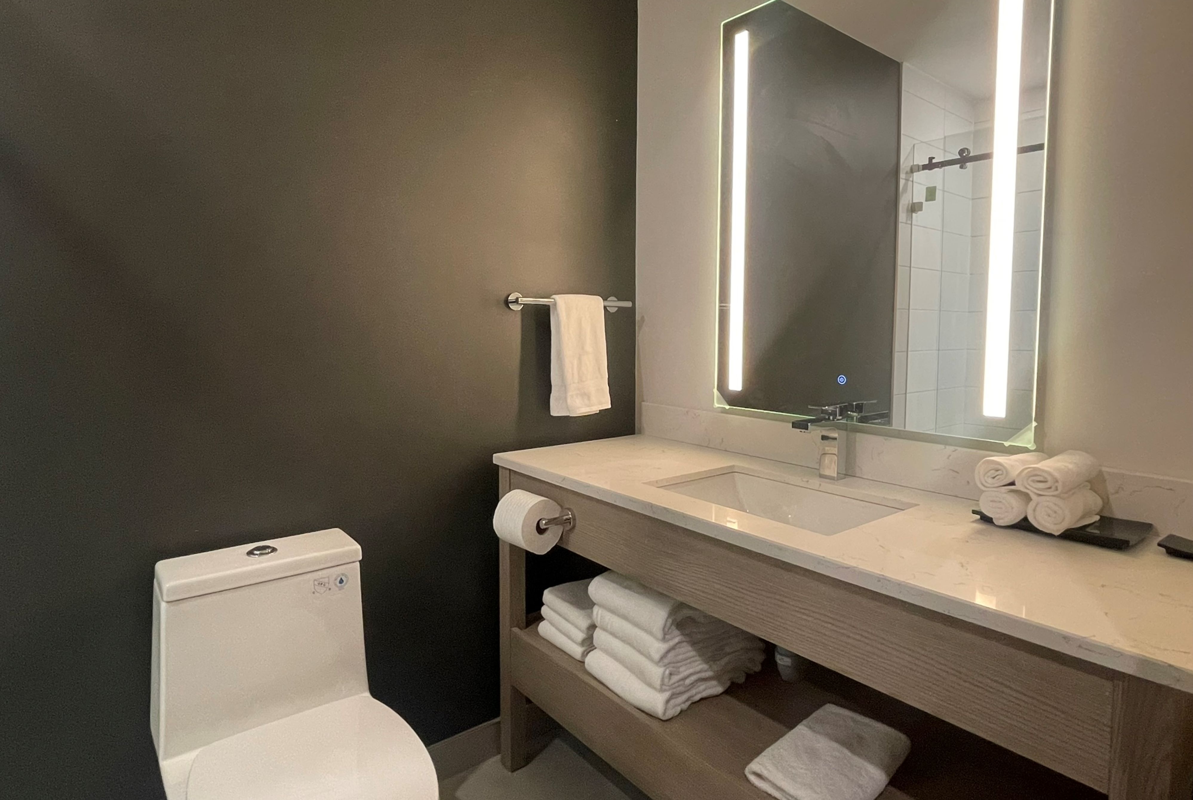 Guest room bath at the La Quinta Inn & Suites by Wyndham Kelowna BC in Kelowna, British Columbia