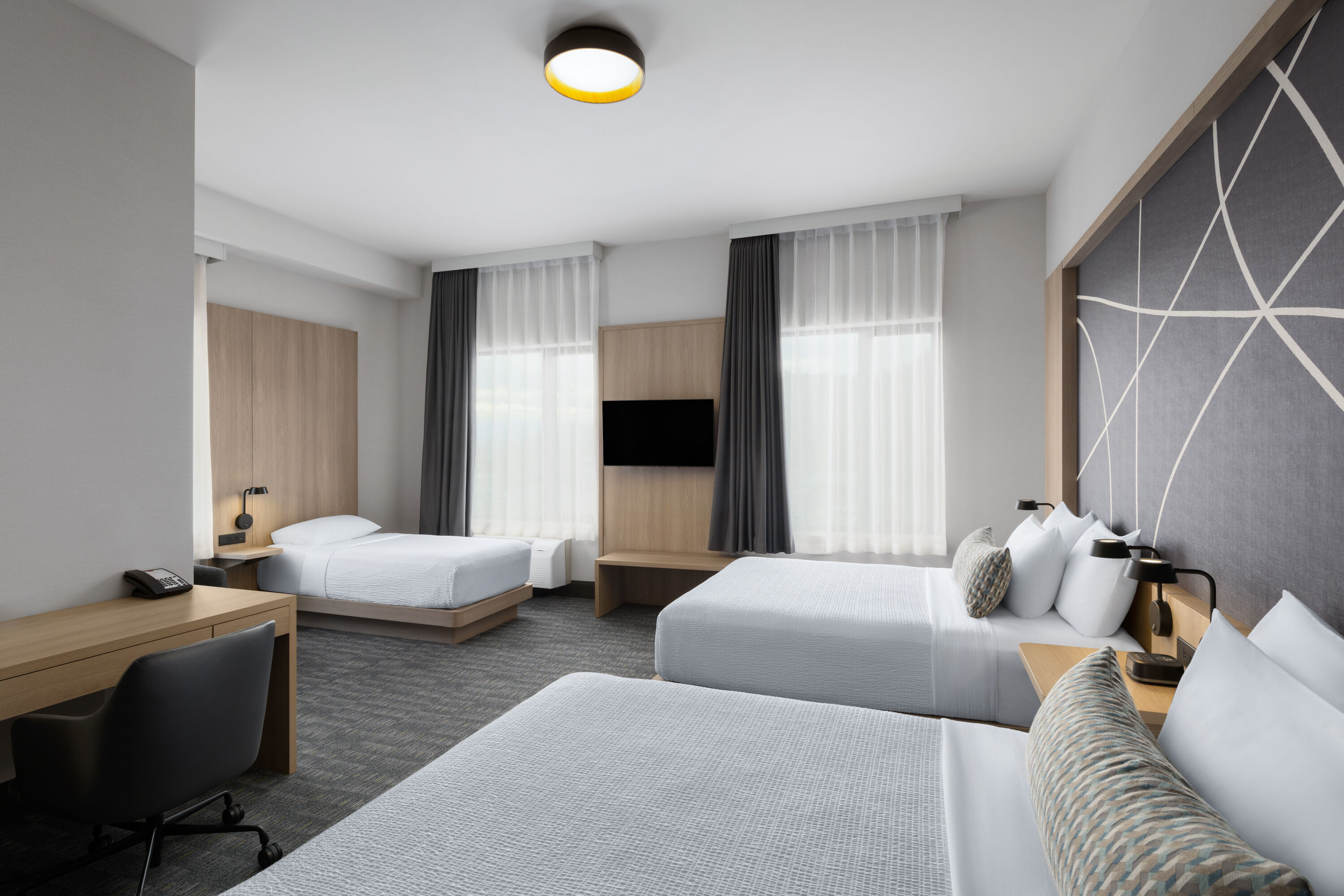 Guest room at the La Quinta Inn & Suites by Wyndham Kelowna BC in Kelowna, British Columbia