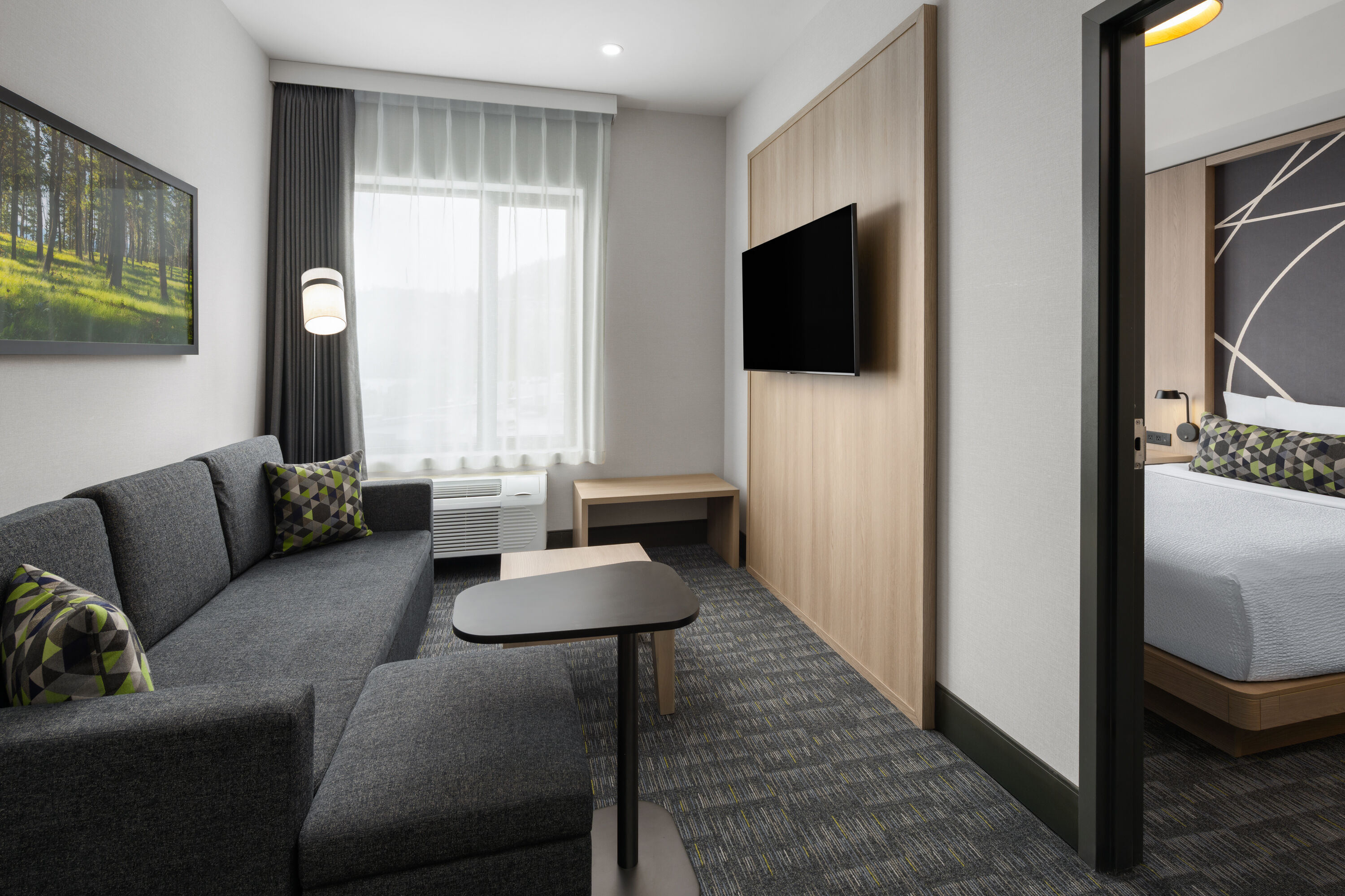 Guest room at the La Quinta Inn & Suites by Wyndham Kelowna BC in Kelowna, British Columbia