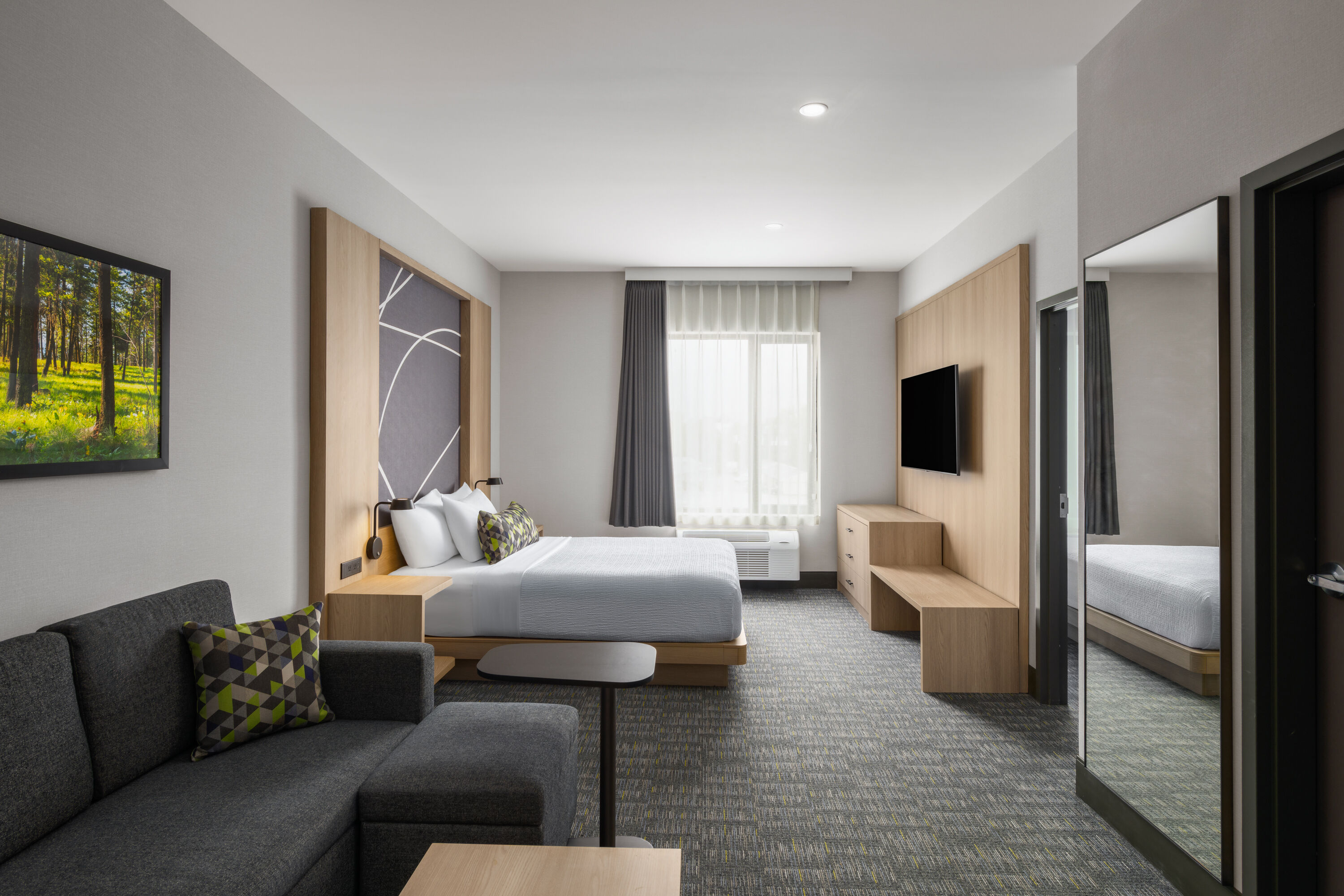 Guest room at the La Quinta Inn & Suites by Wyndham Kelowna BC in Kelowna, British Columbia