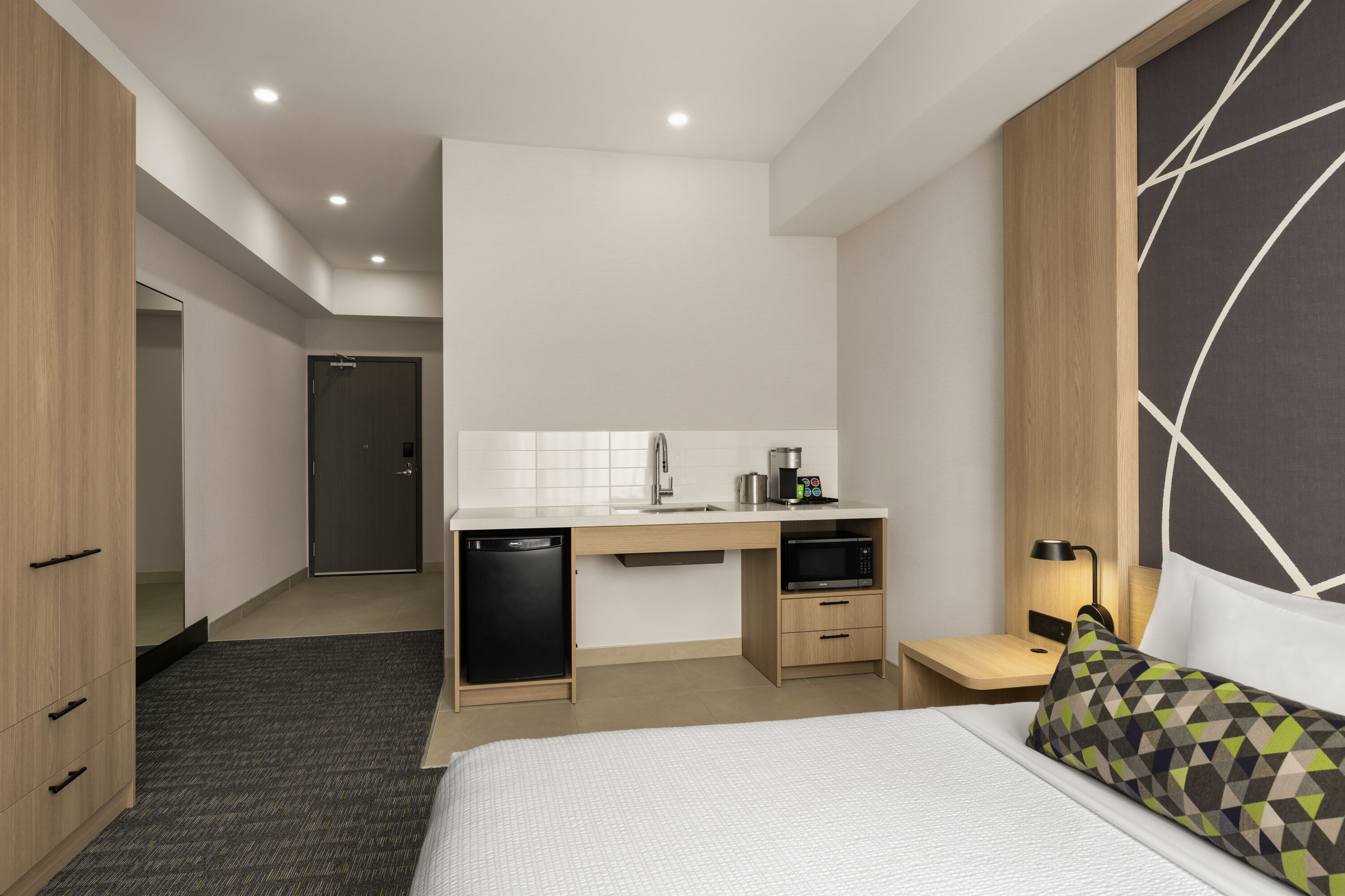 Guest room at the La Quinta Inn & Suites by Wyndham Kelowna BC in Kelowna, British Columbia