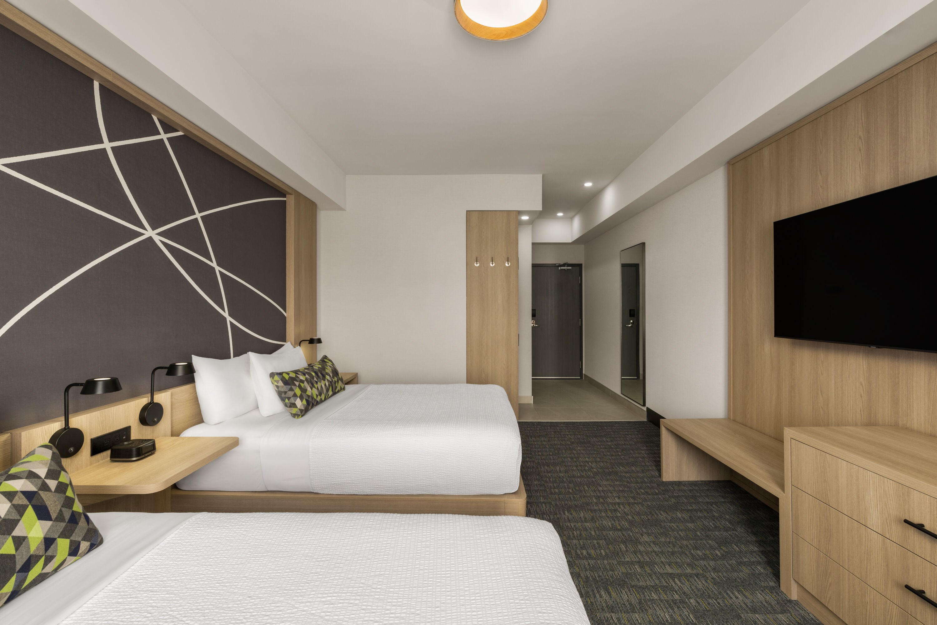 Guest room at the La Quinta Inn & Suites by Wyndham Kelowna BC in Kelowna, British Columbia