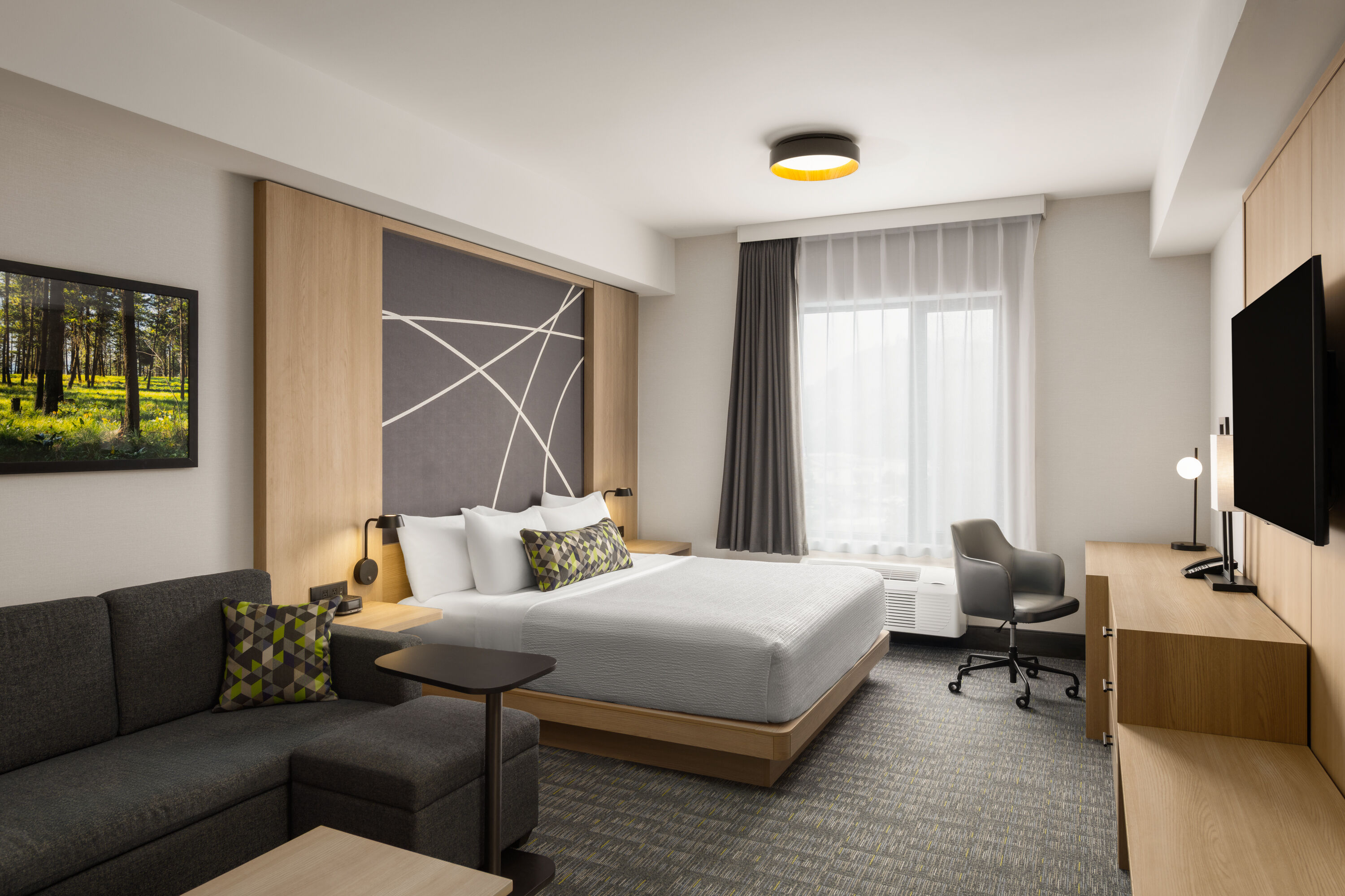 Guest room at the La Quinta Inn & Suites by Wyndham Kelowna BC in Kelowna, British Columbia