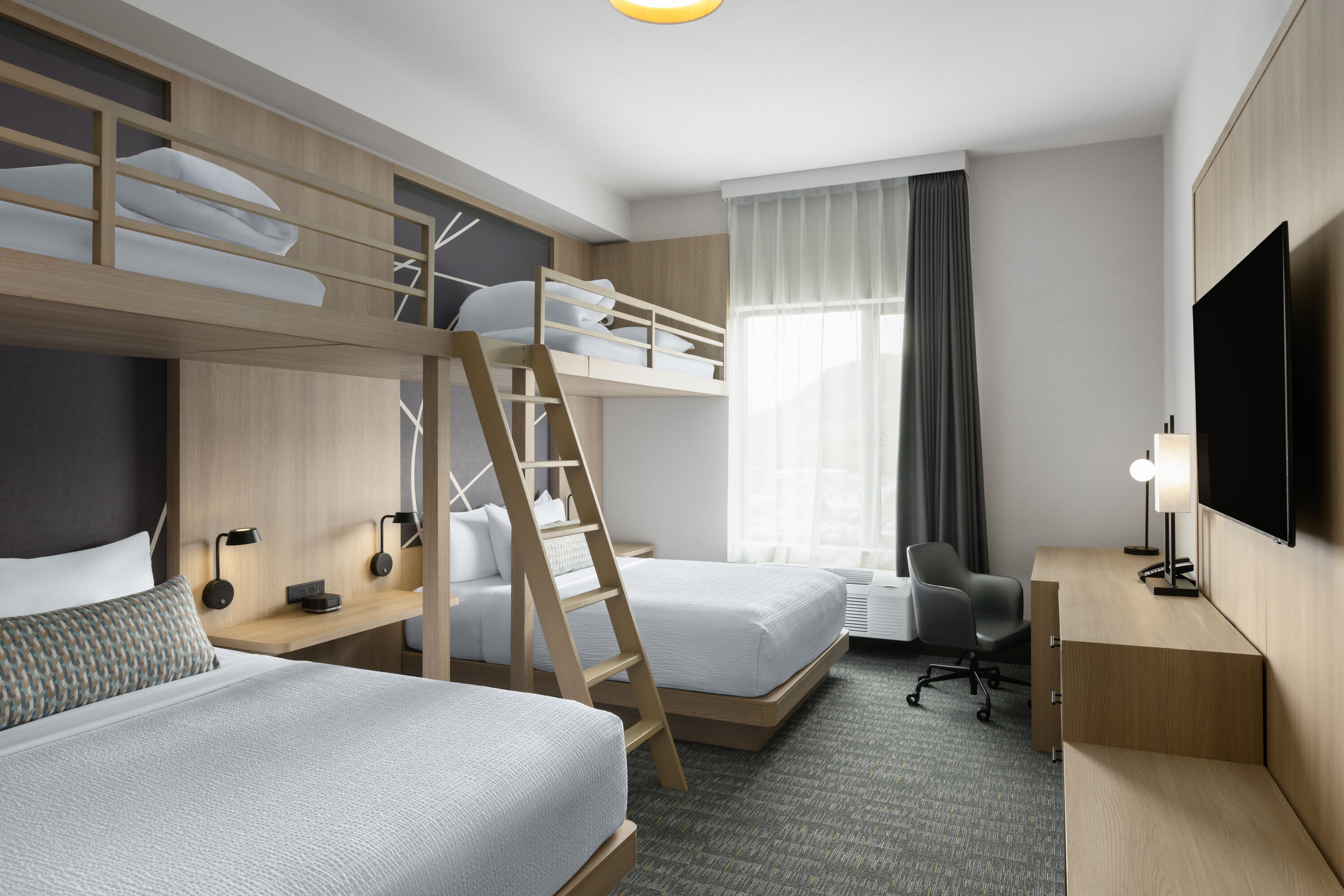 Guest room at the La Quinta Inn & Suites by Wyndham Kelowna BC in Kelowna, British Columbia