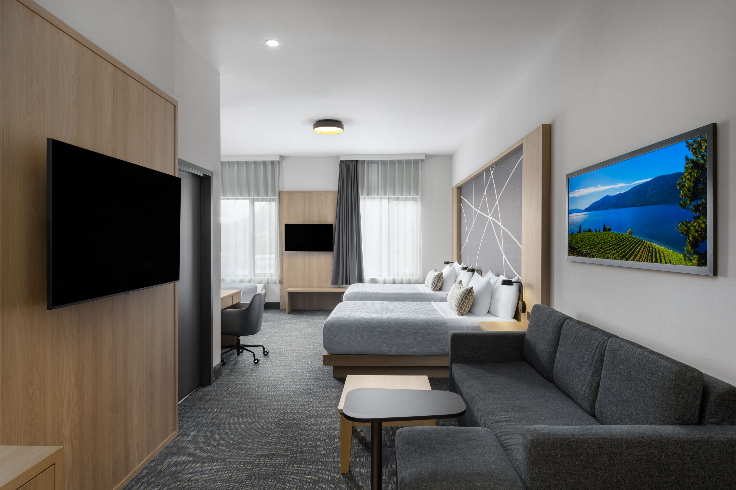 Guest room at the La Quinta Inn & Suites by Wyndham Kelowna BC in Kelowna, British Columbia