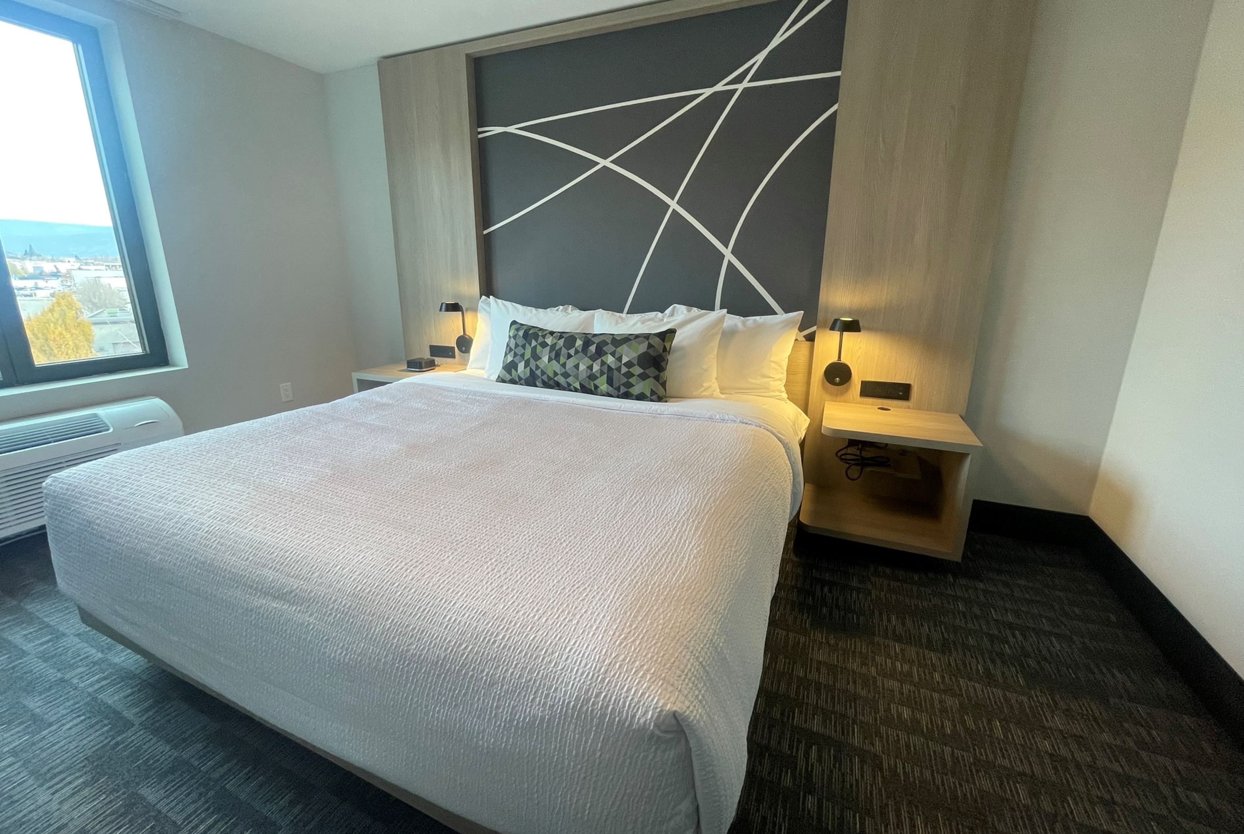 Guest room at the La Quinta Inn & Suites by Wyndham Kelowna BC in Kelowna, British Columbia