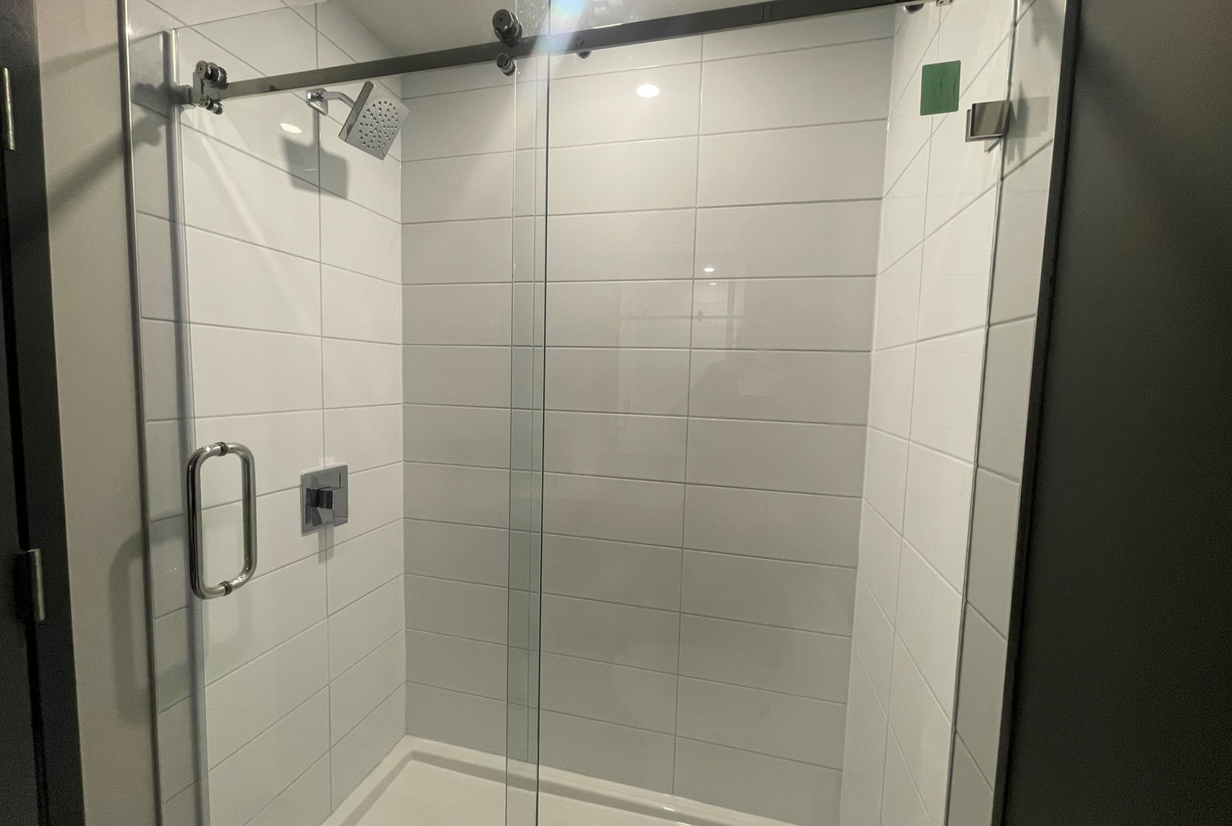 Guest room bath at the La Quinta Inn & Suites by Wyndham Kelowna BC in Kelowna, British Columbia