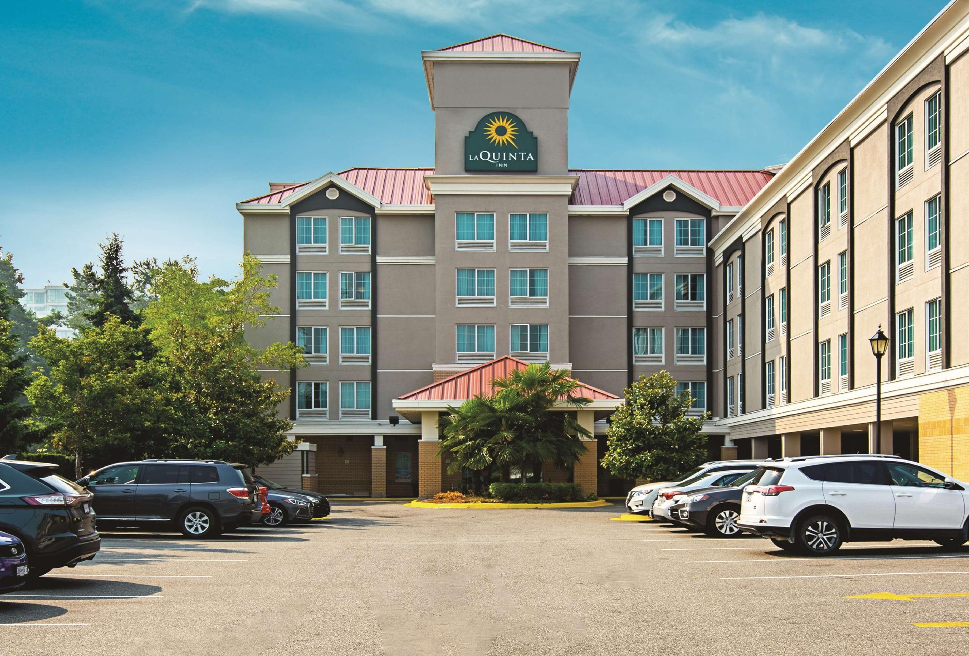 Exterior of La Quinta Inn by Wyndham Vancouver Airport hotel in Richmond, British Columbia