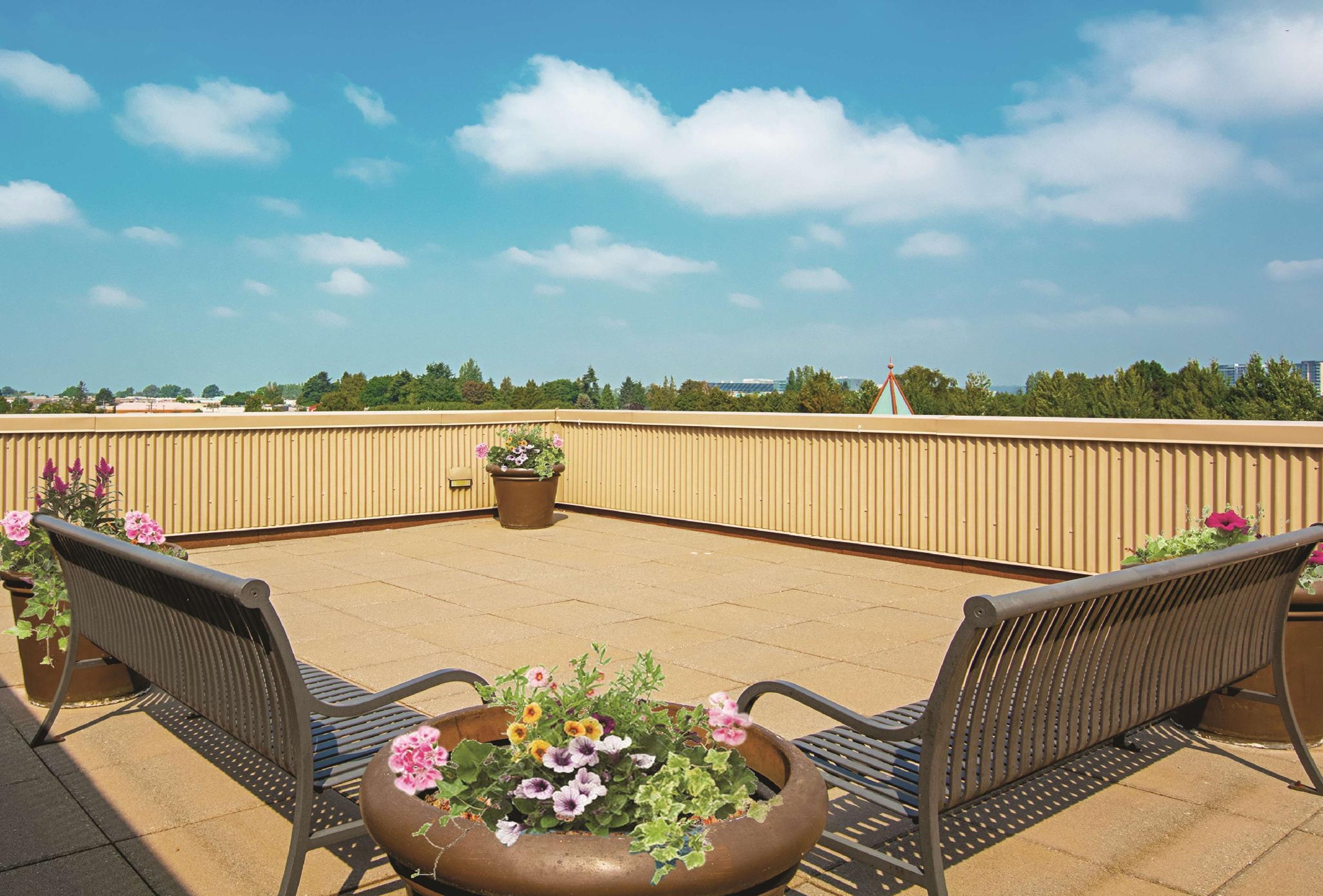 Exterior of La Quinta Inn by Wyndham Vancouver Airport hotel in Richmond, British Columbia