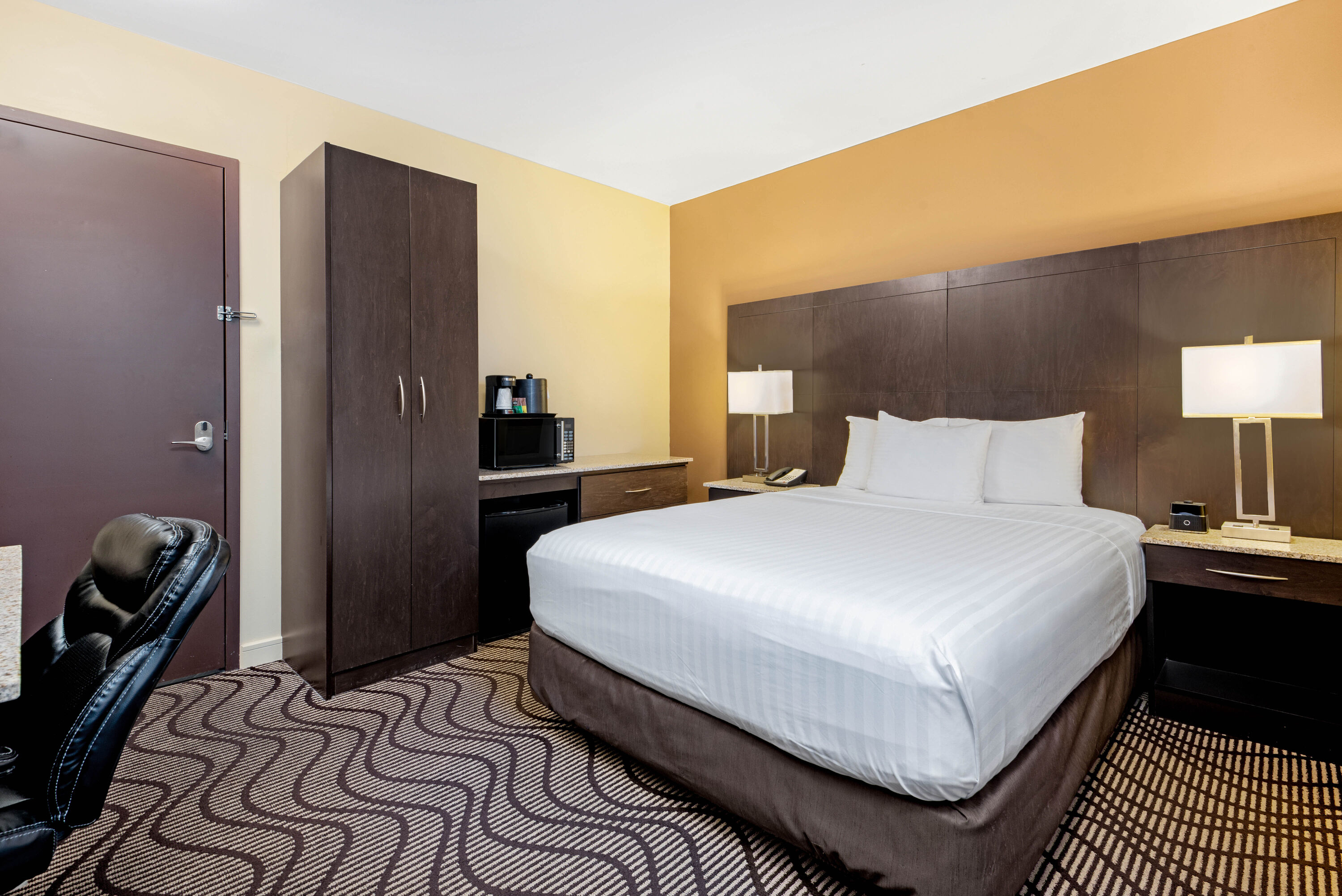Guest room at the La Quinta Inn & Suites by Wyndham Oshawa in Oshawa, Ontario