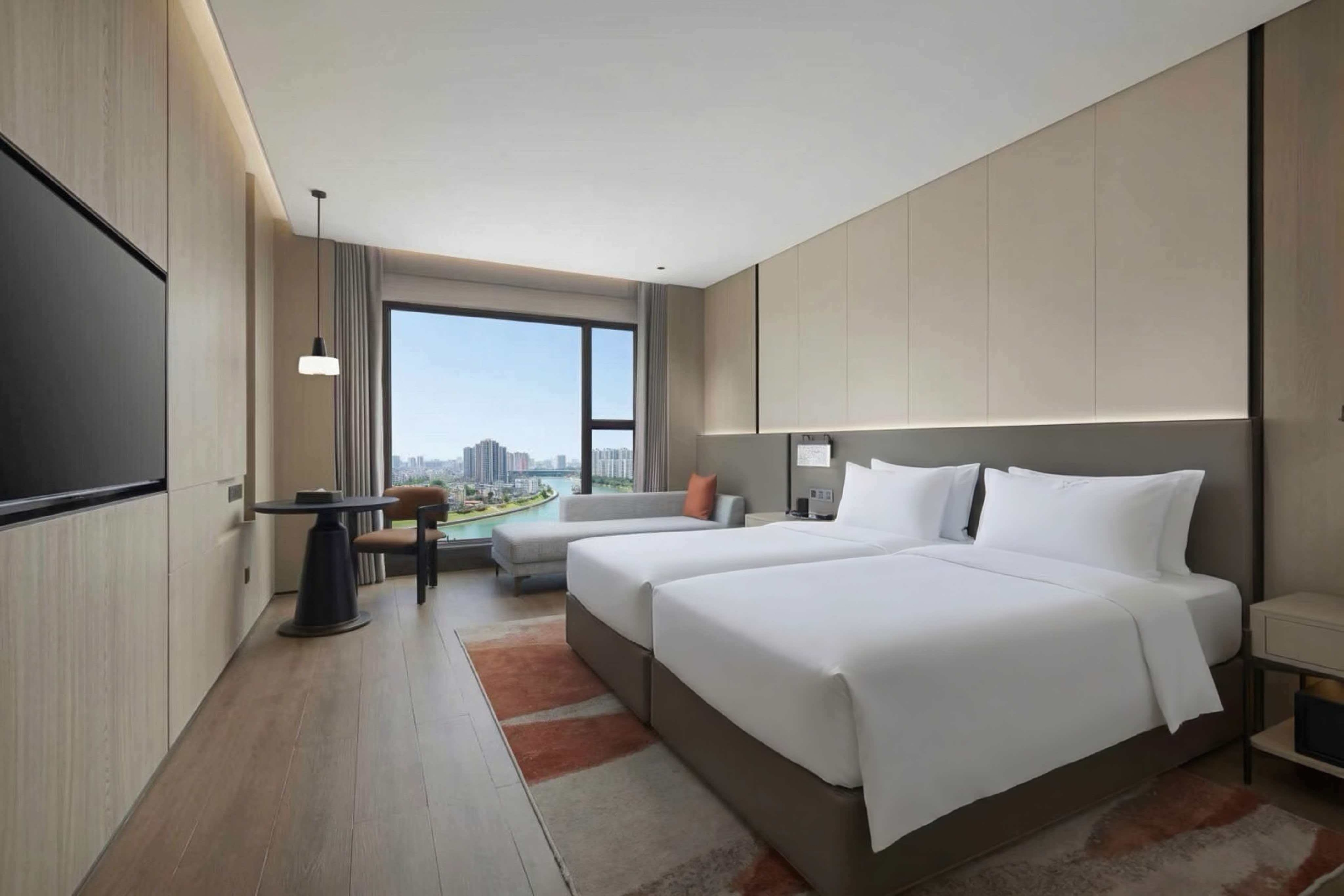 Guest room at the La Quinta by Wyndham Qinzhou Qinnan in Qinzhou, Other than US/Canada