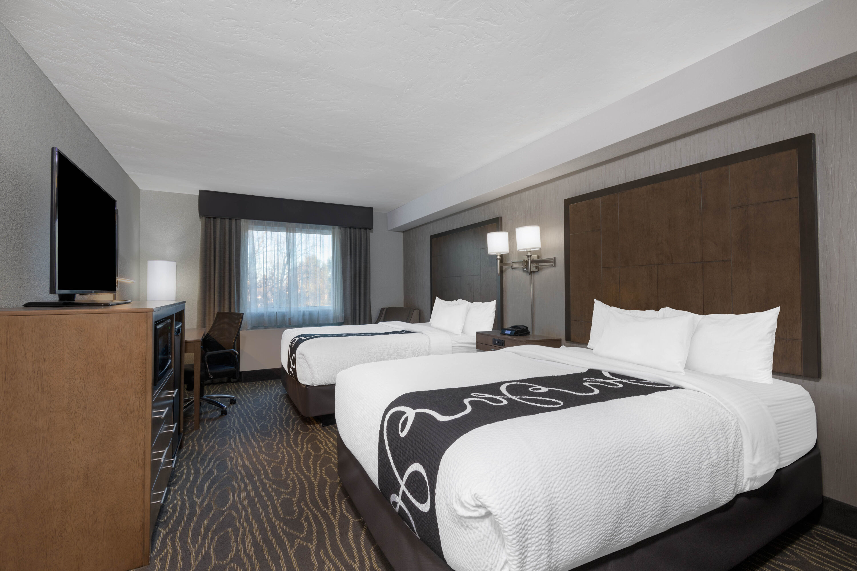 Guest room at the La Quinta Inn & Suites by Wyndham Anchorage Airport in Anchorage, Alaska