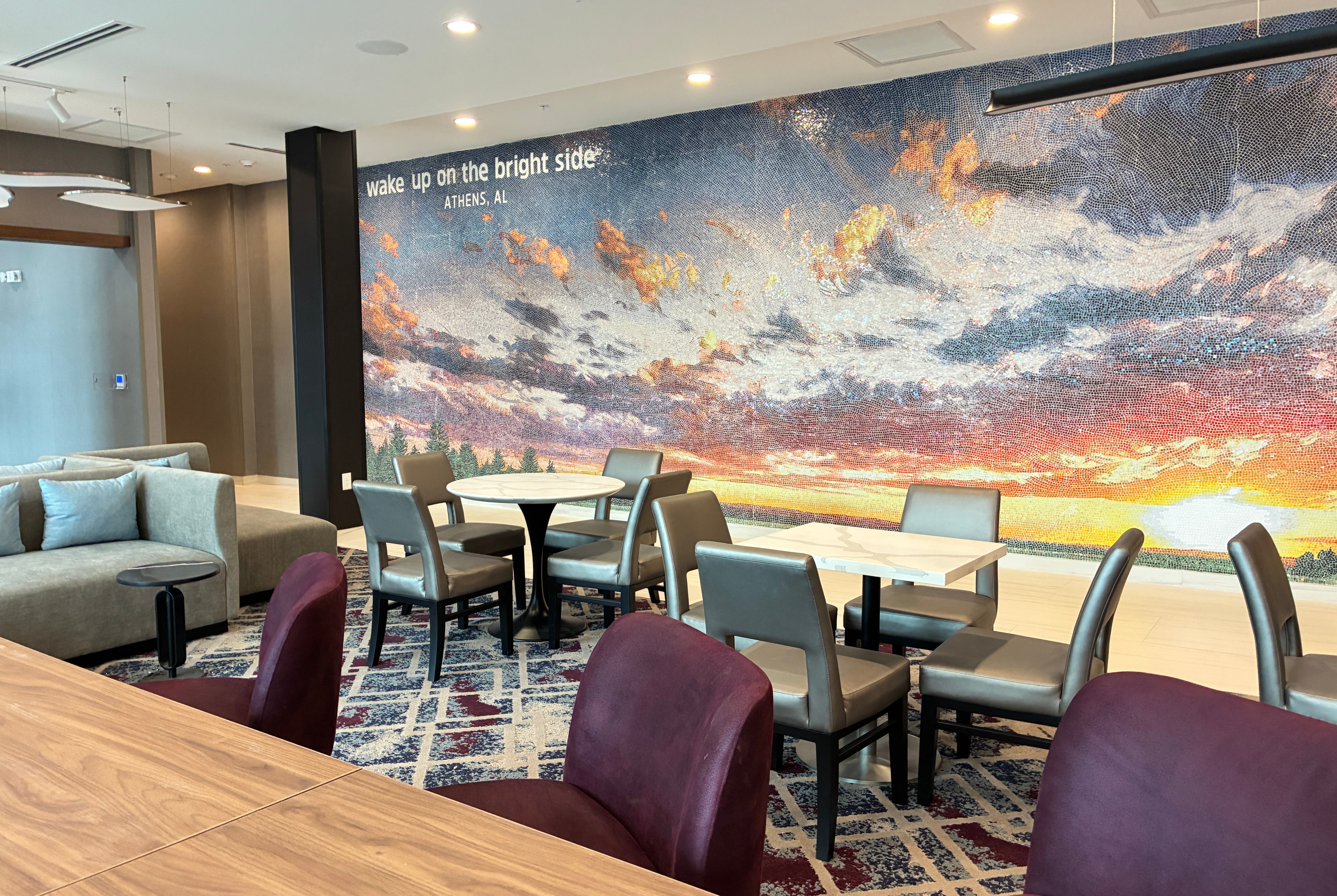 La Quinta Inn & Suites by Wyndham Athens restaurant breakfast area with seating in Athens, Alabama