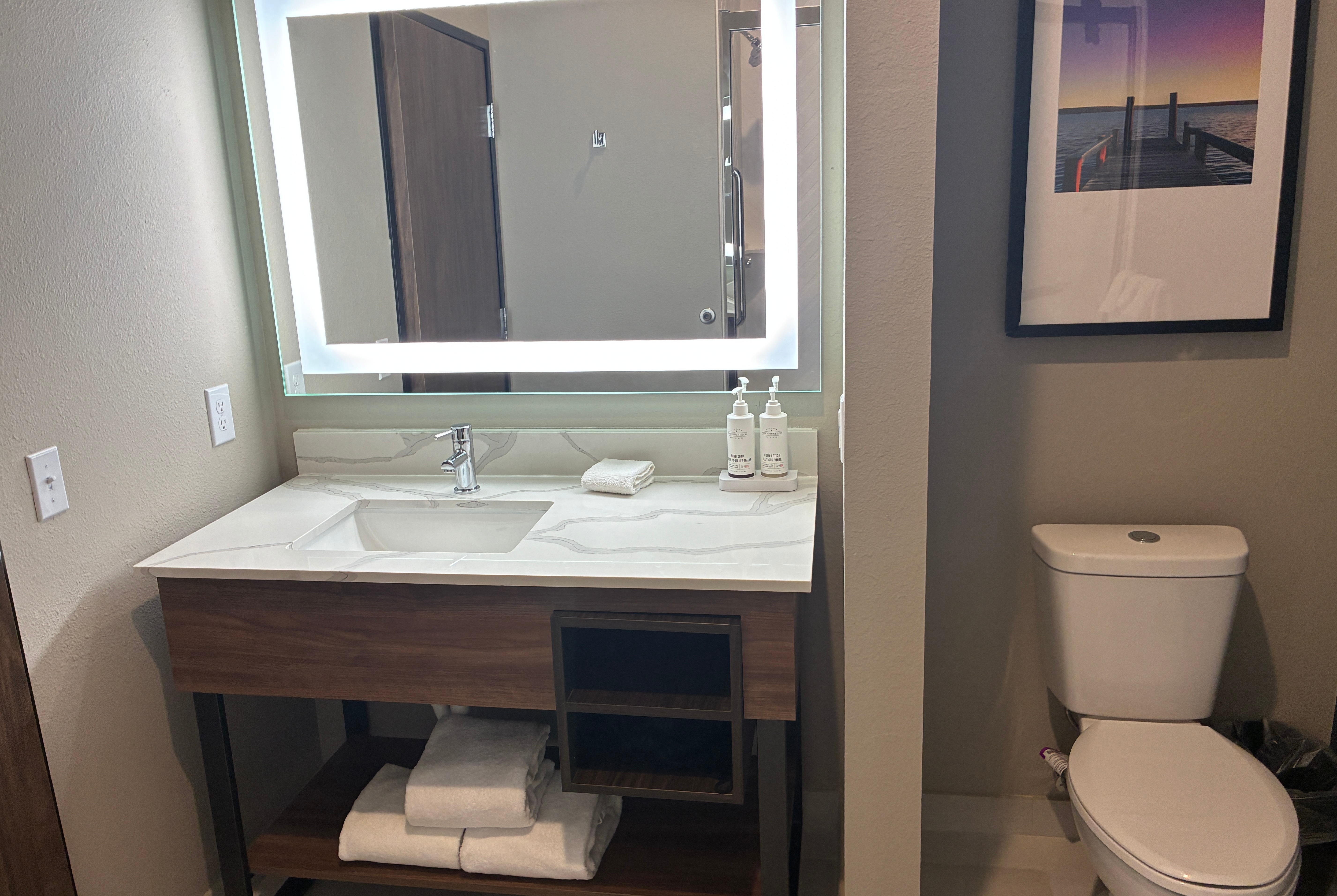 Guest room bath at the La Quinta Inn & Suites by Wyndham Athens in Athens, Alabama