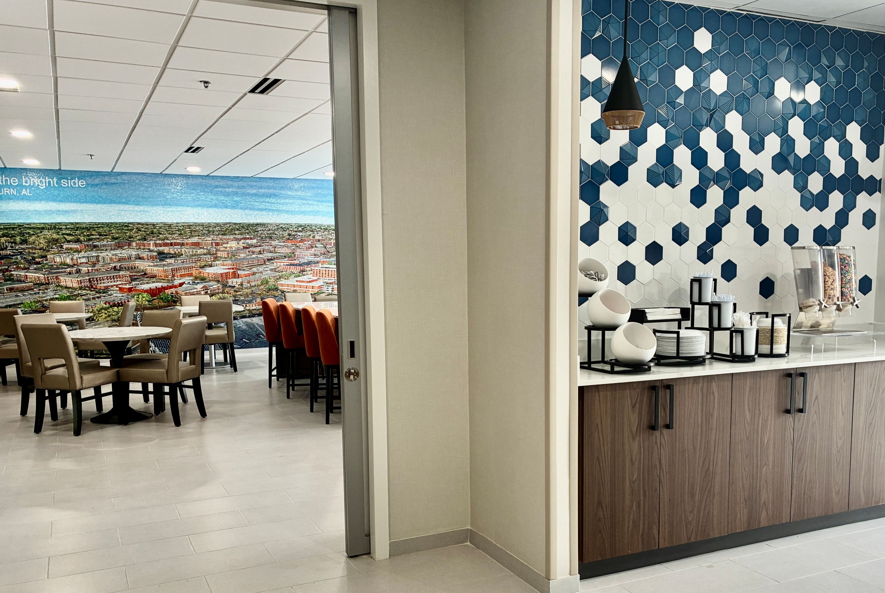 La Quinta Inn & Suites by Wyndham Auburn - University Area restaurant breakfast area with seating in Auburn, Alabama