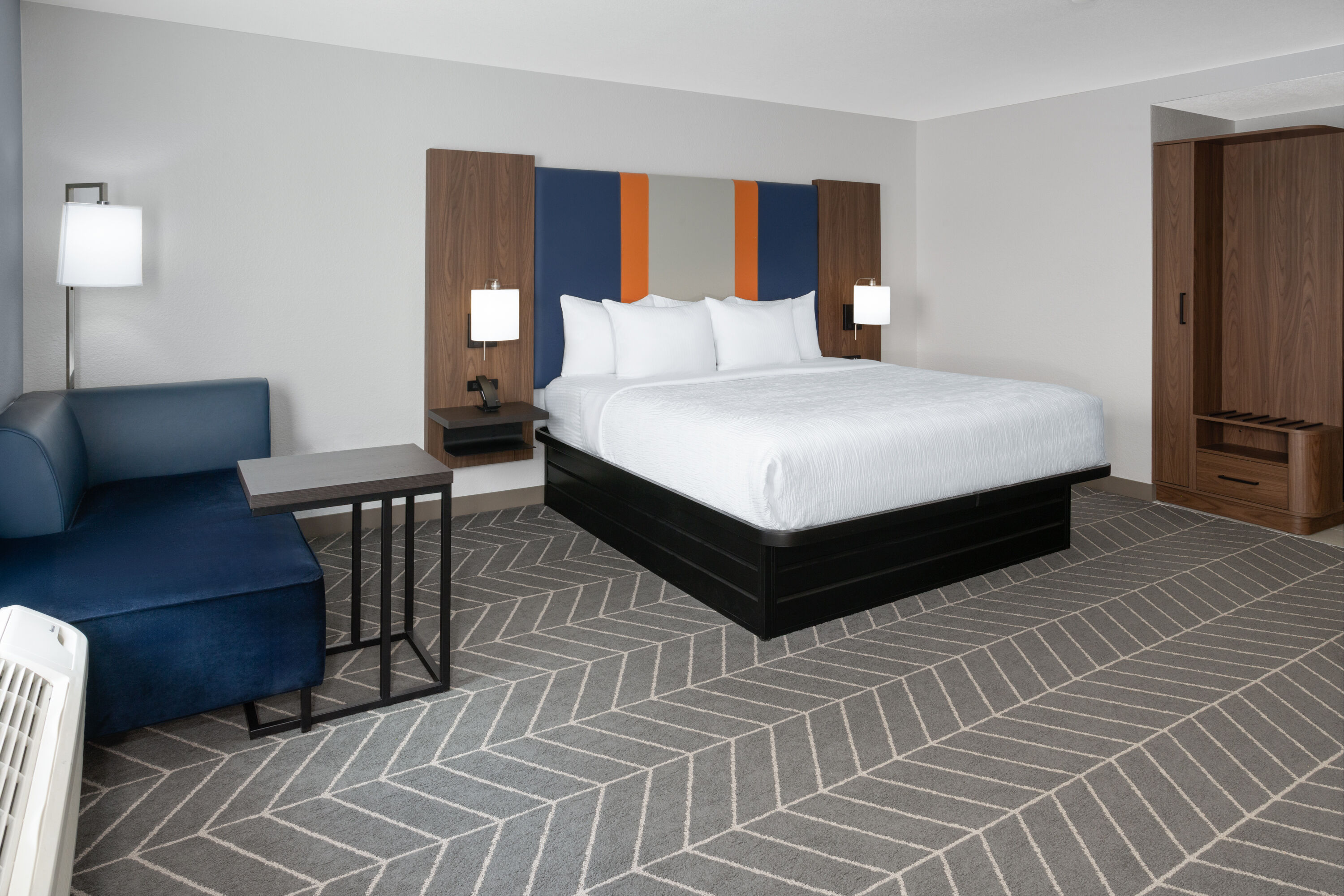 Guest room at the La Quinta Inn & Suites by Wyndham Auburn - University Area in Auburn, Alabama