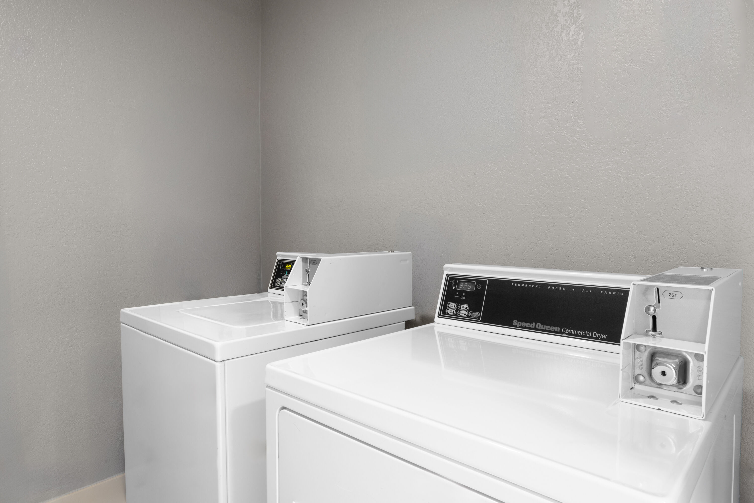 Laundry facilities at La Quinta Inn & Suites by Wyndham Auburn - University Area in Auburn, Alabama