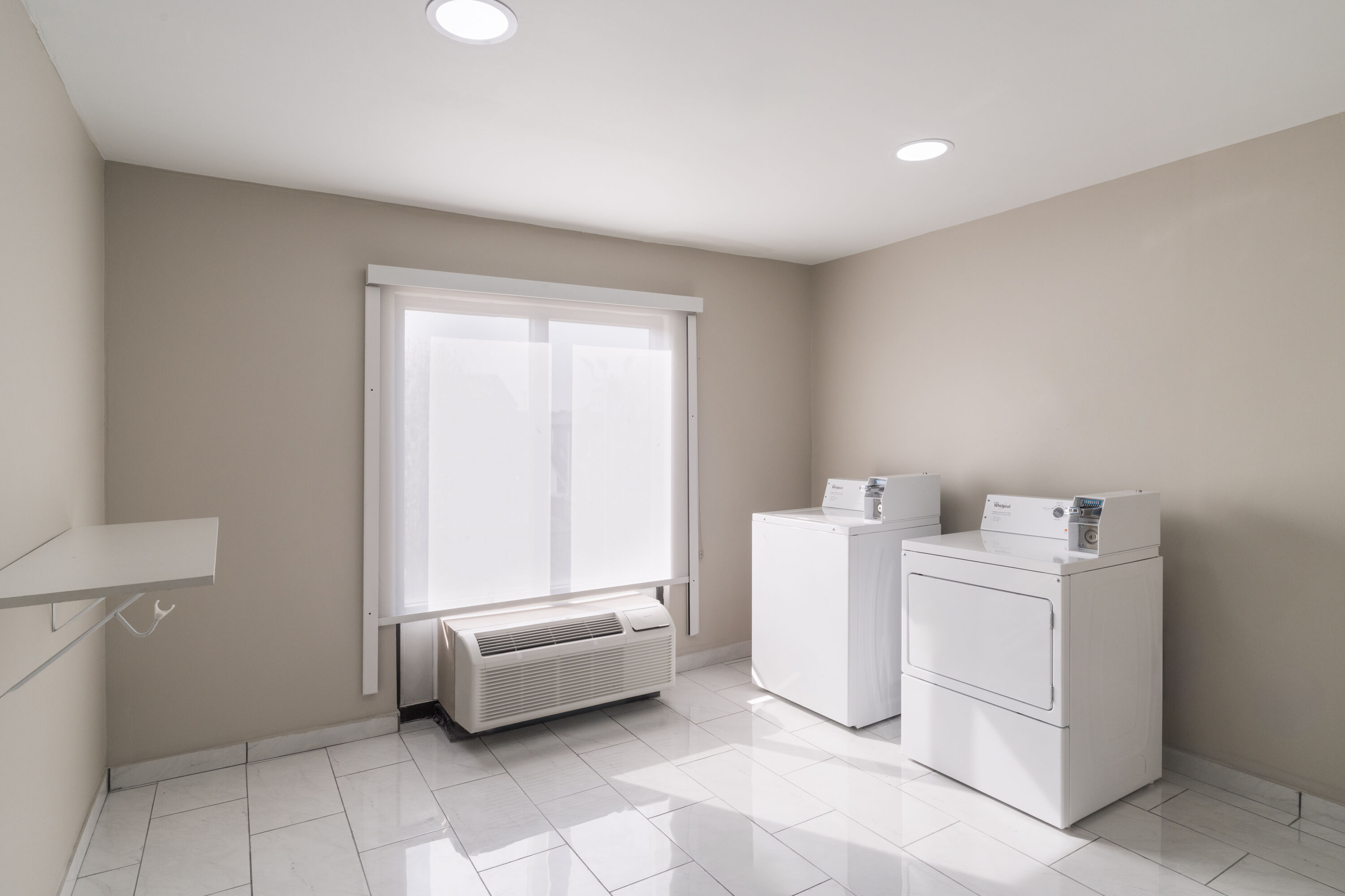 Laundry facilities at La Quinta Inn & Suites by Wyndham Bessemer in Bessemer, Alabama