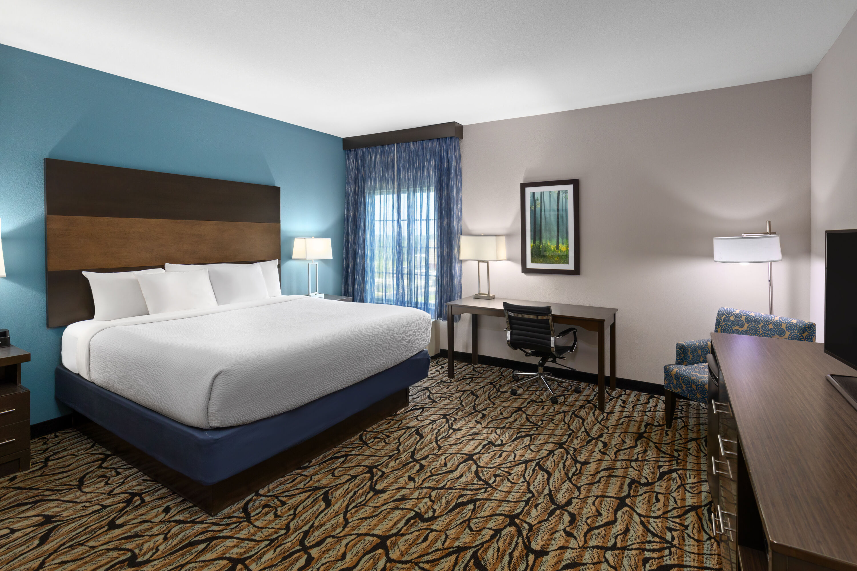 Guest room at the La Quinta Inn & Suites by Wyndham Cullman in Cullman, Alabama