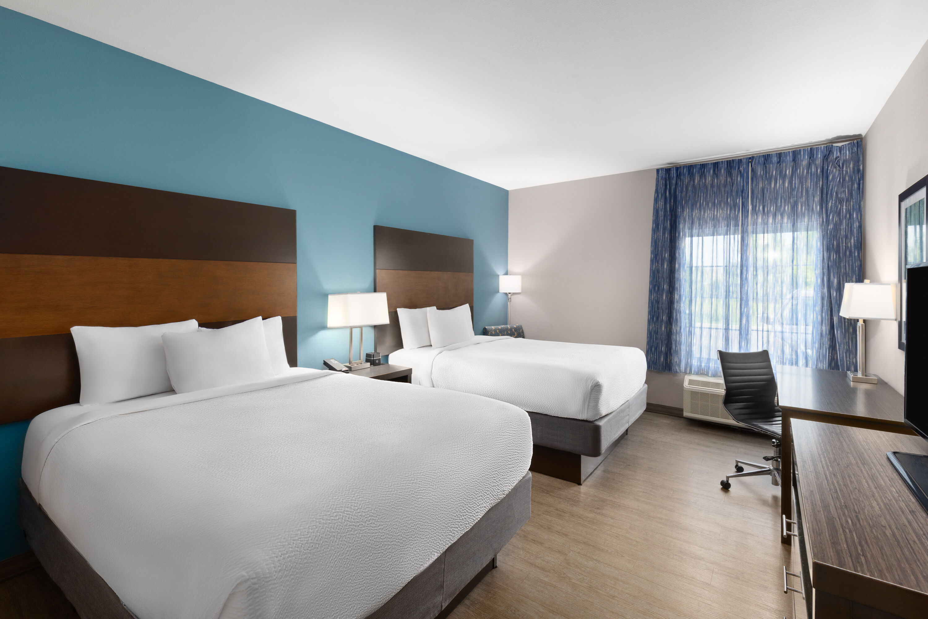 Guest room at the La Quinta Inn & Suites by Wyndham Cullman in Cullman, Alabama