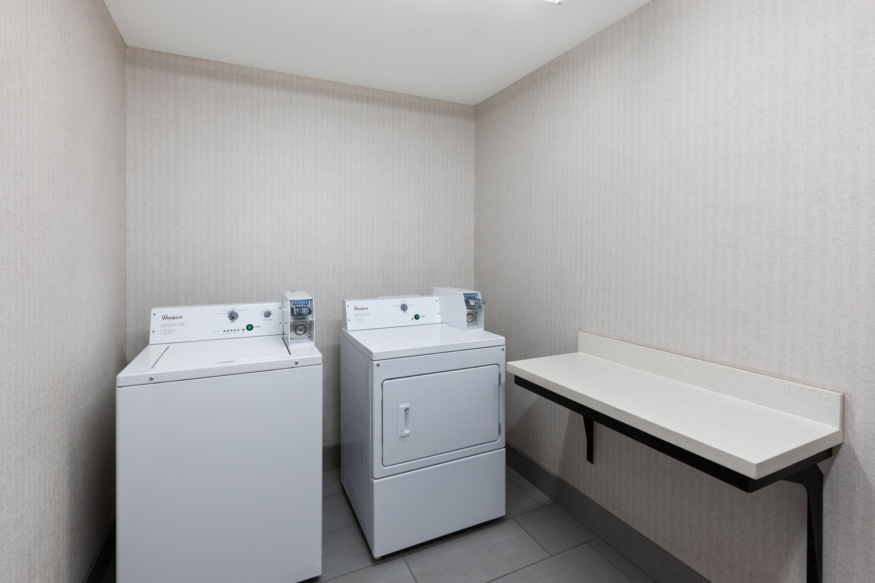 Laundry facilities at La Quinta Inn & Suites by Wyndham Cullman in Cullman, Alabama