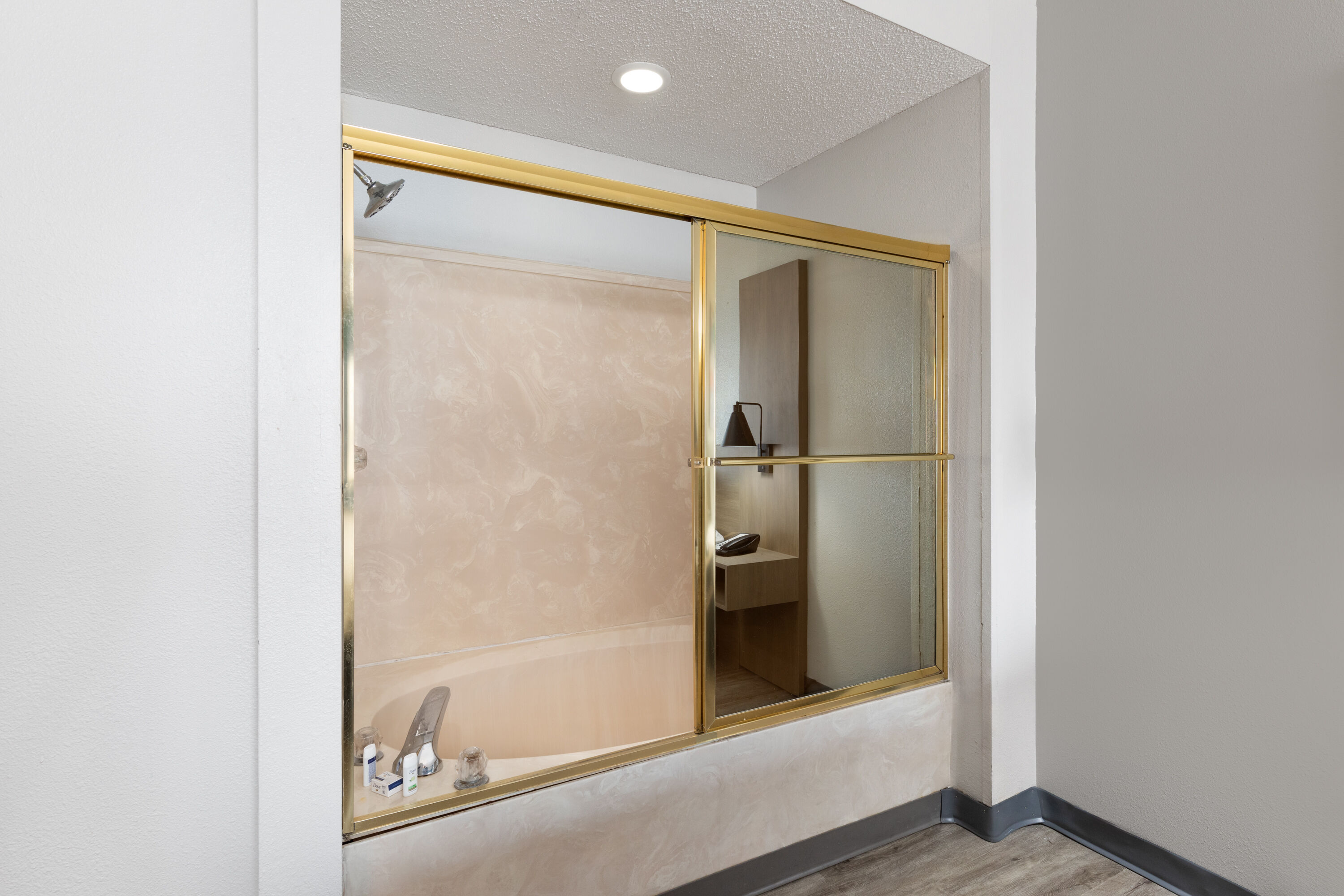 Guest room bath at the La Quinta Inn by Wyndham Decatur in Decatur, Alabama