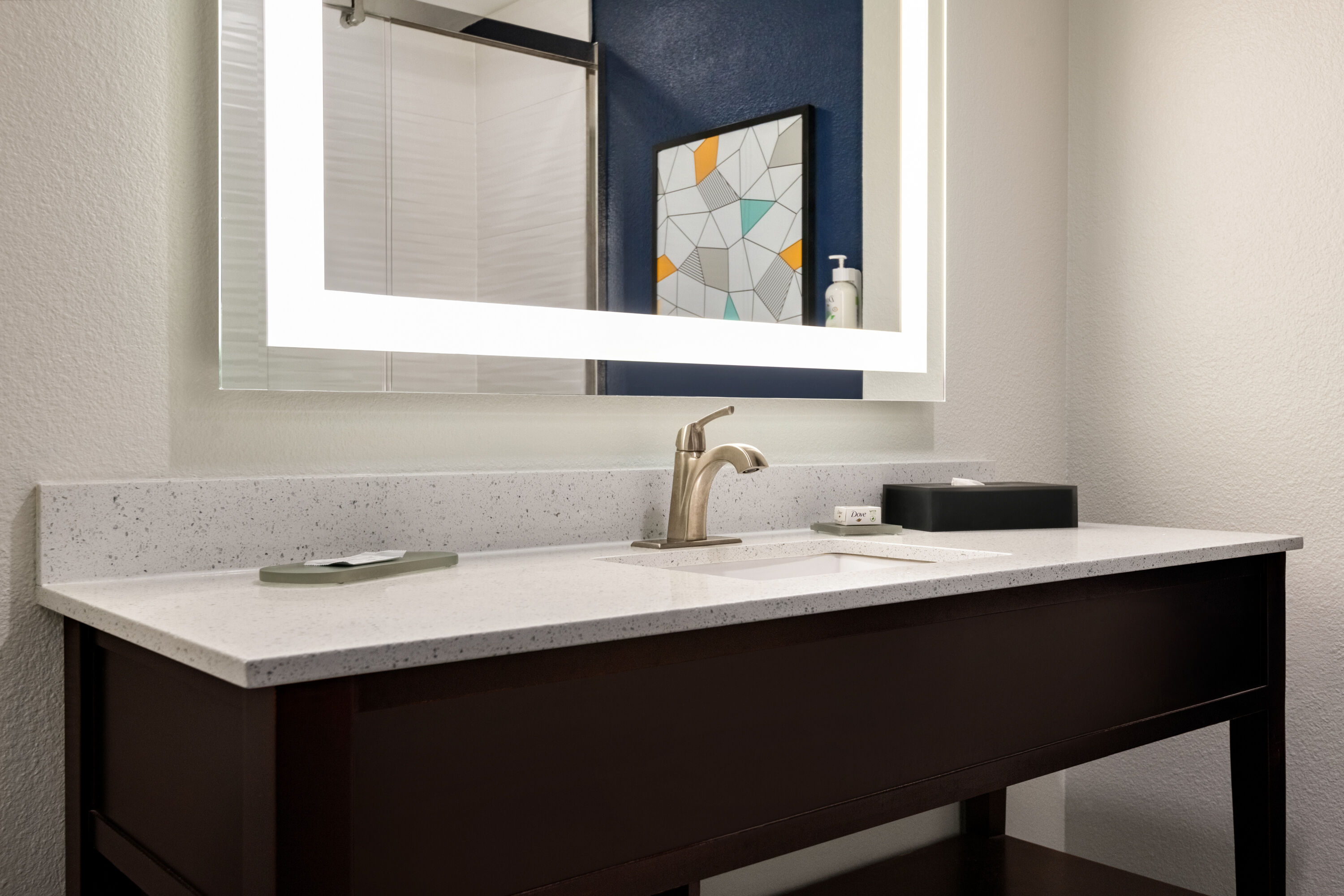 Guest room bath at the La Quinta Inn & Suites by Wyndham Montgomery in Montgomery, Alabama