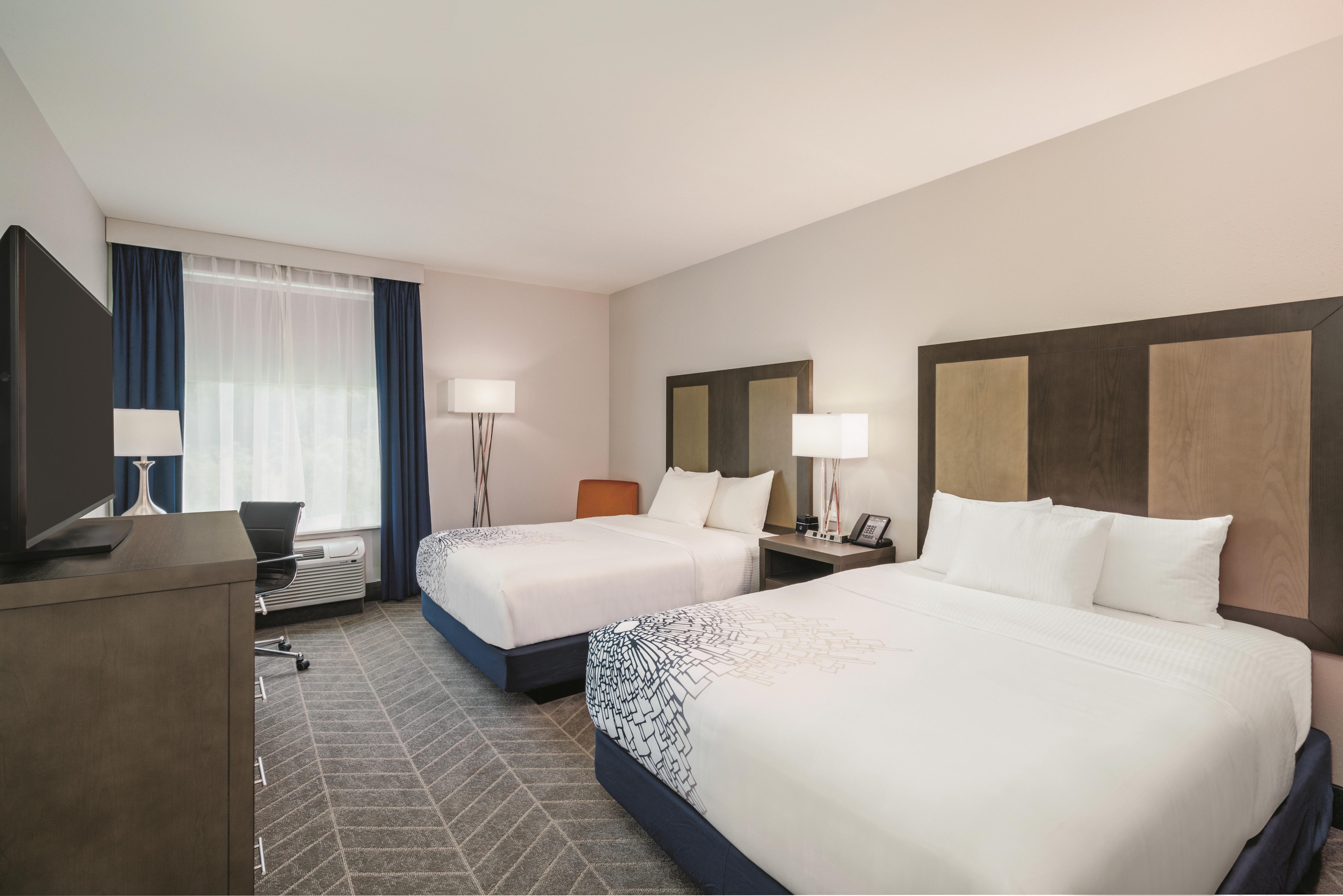 Guest room at the La Quinta Inn & Suites by Wyndham Opelika Auburn in Opelika, Alabama