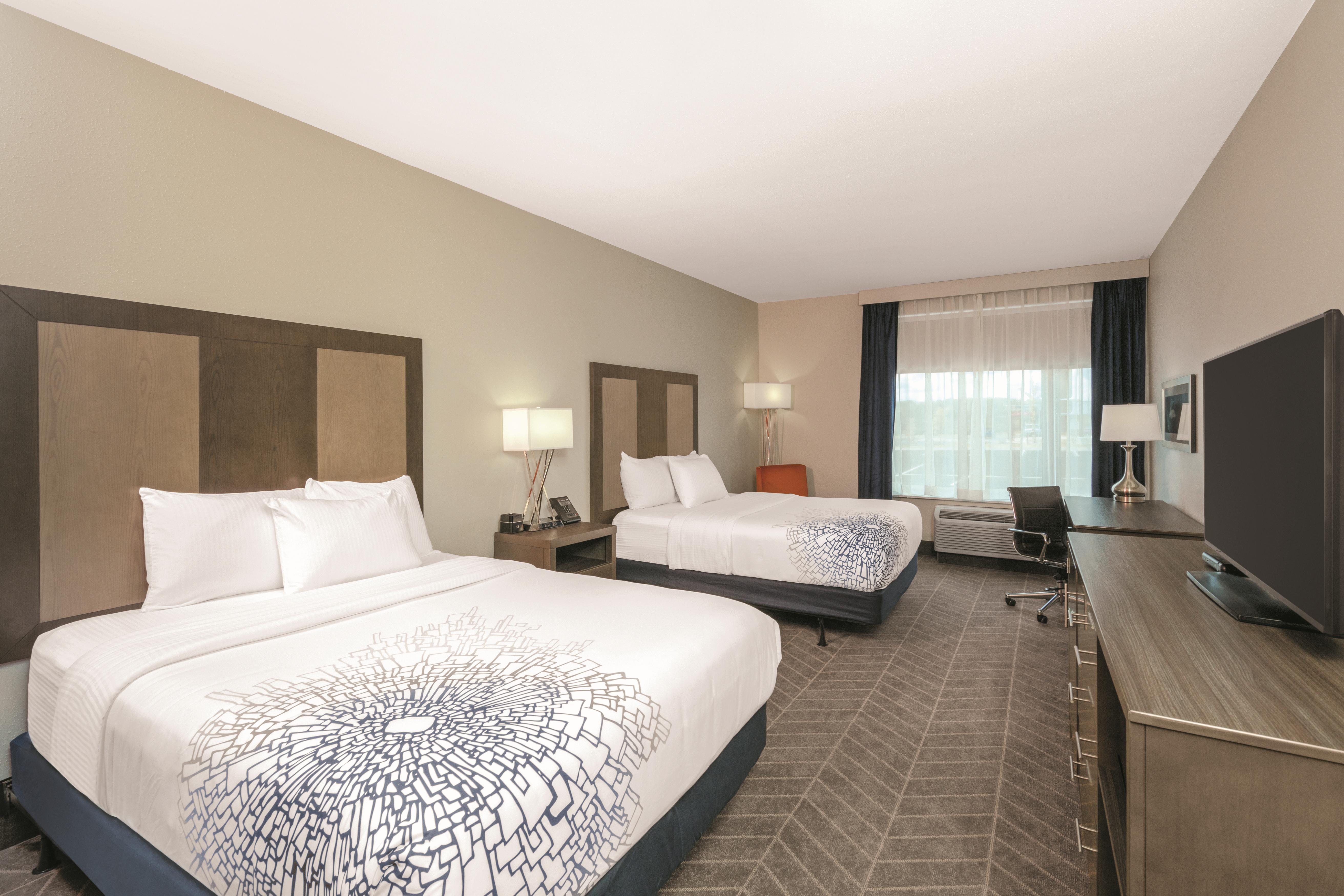 Guest room at the La Quinta Inn & Suites by Wyndham Opelika Auburn in Opelika, Alabama