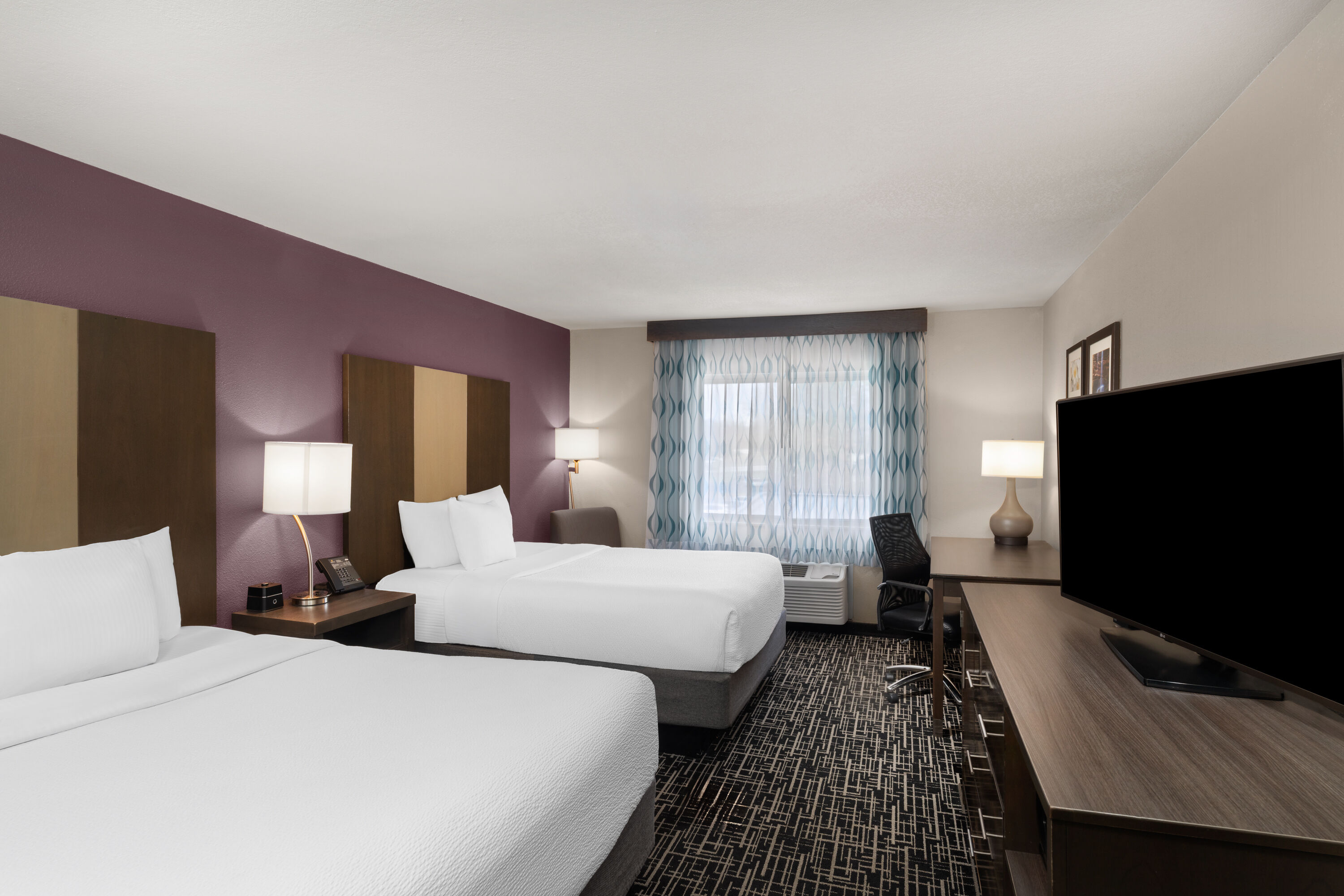 Guest room at the La Quinta Inn & Suites by Wyndham Fayetteville in Fayetteville, Arkansas