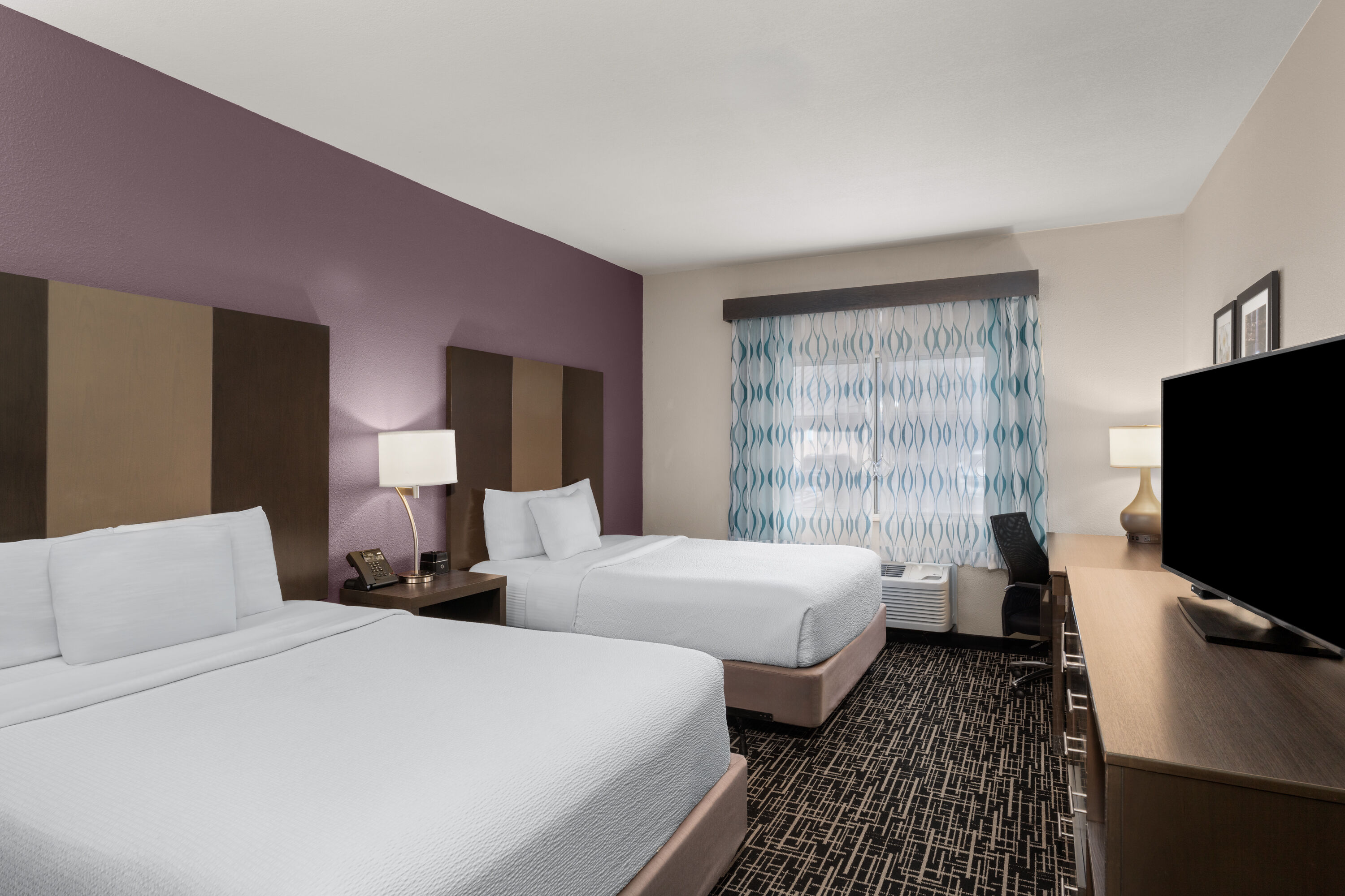 Guest room at the La Quinta Inn & Suites by Wyndham Fayetteville in Fayetteville, Arkansas