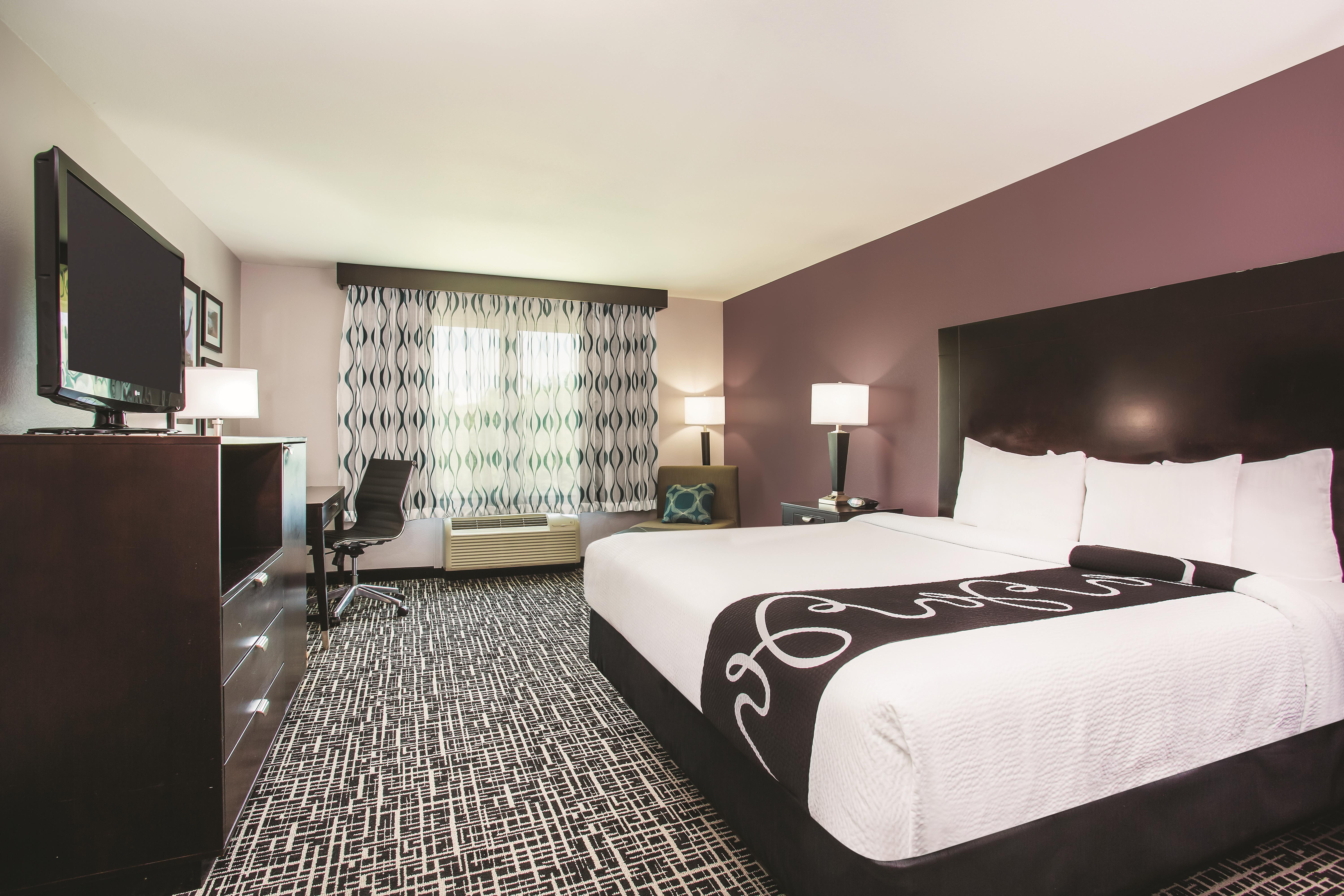 Guest room at the La Quinta Inn & Suites by Wyndham Russellville in Russellville, Arkansas