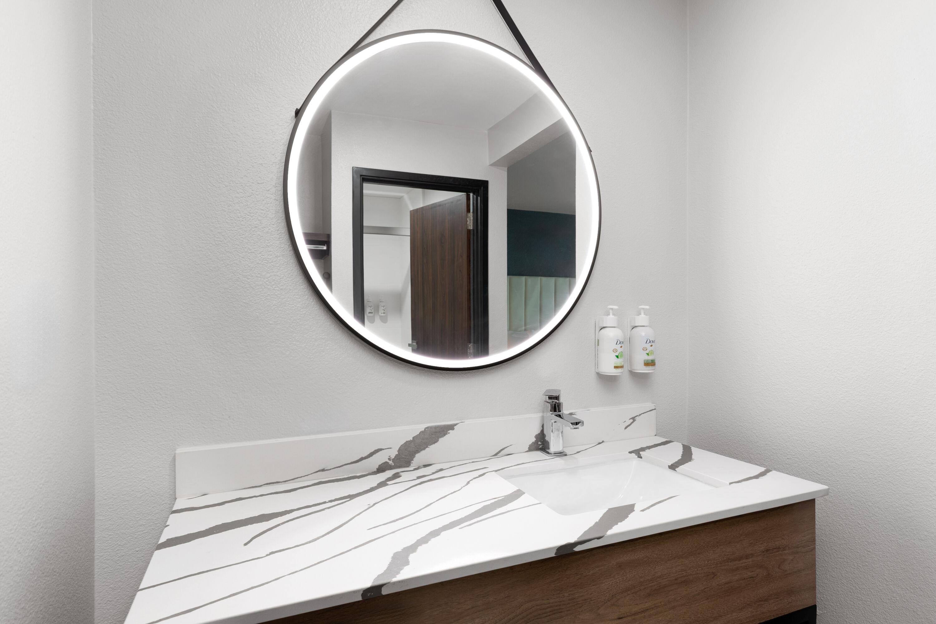 Guest room bath at the La Quinta Inn & Suites by Wyndham Springdale in Springdale, Arkansas