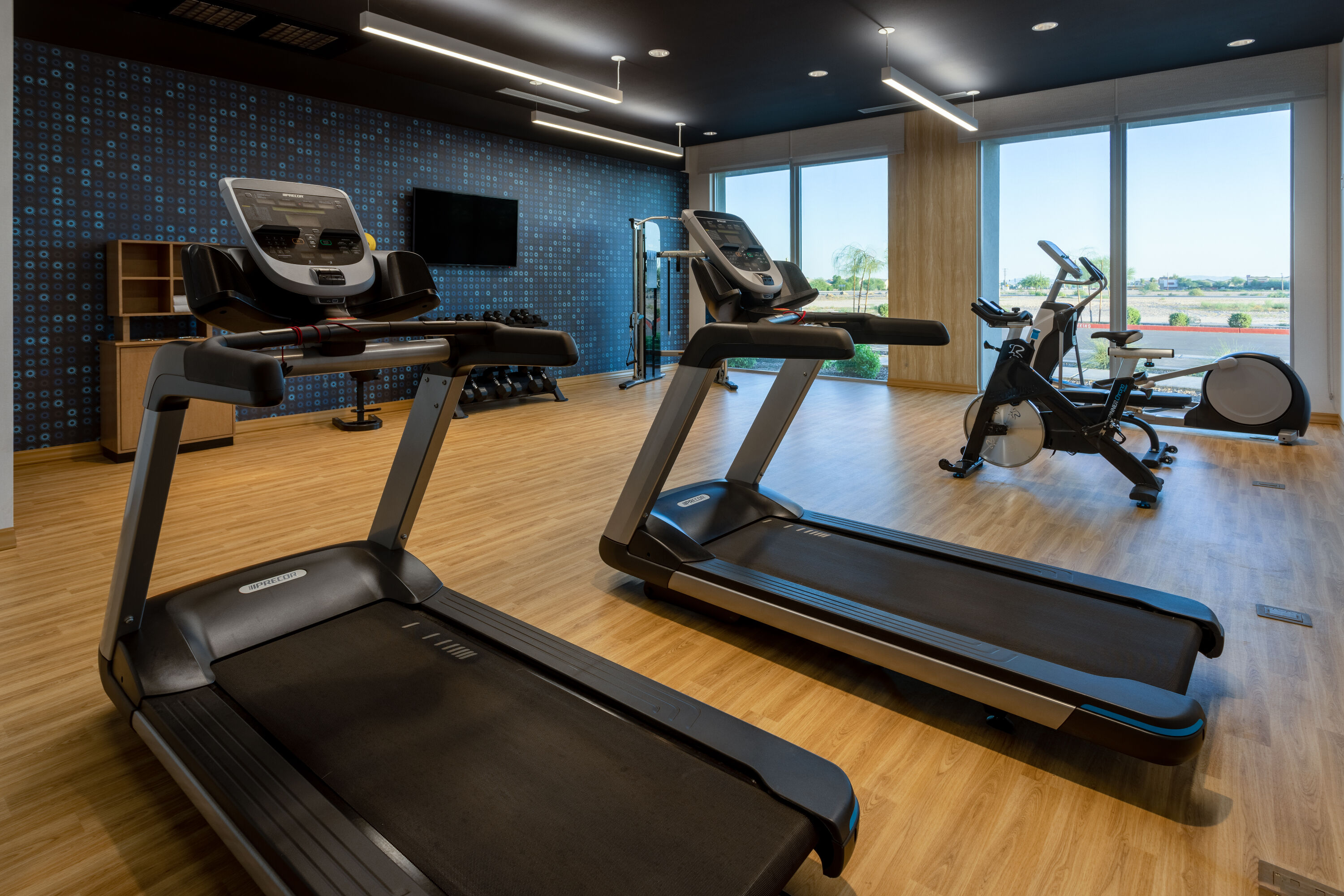 Fitness room at La Quinta Inn & Suites by Wyndham Maricopa - Copper Sky in Maricopa, Arizona