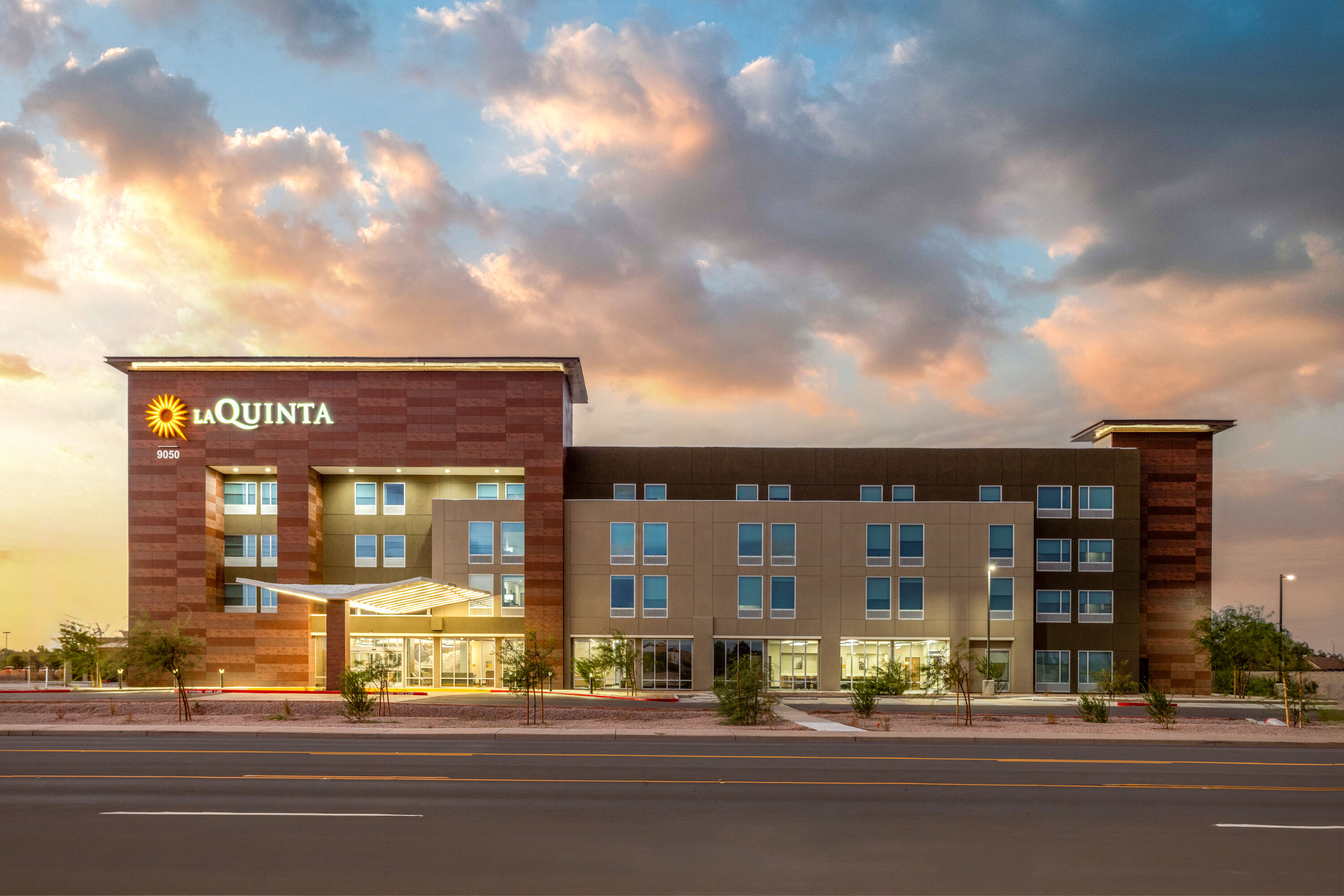 Exterior Dusk Image of La Quinta Inn & Suites by Wyndham Phoenix West / Glendale hotel in Phoenix, Arizona