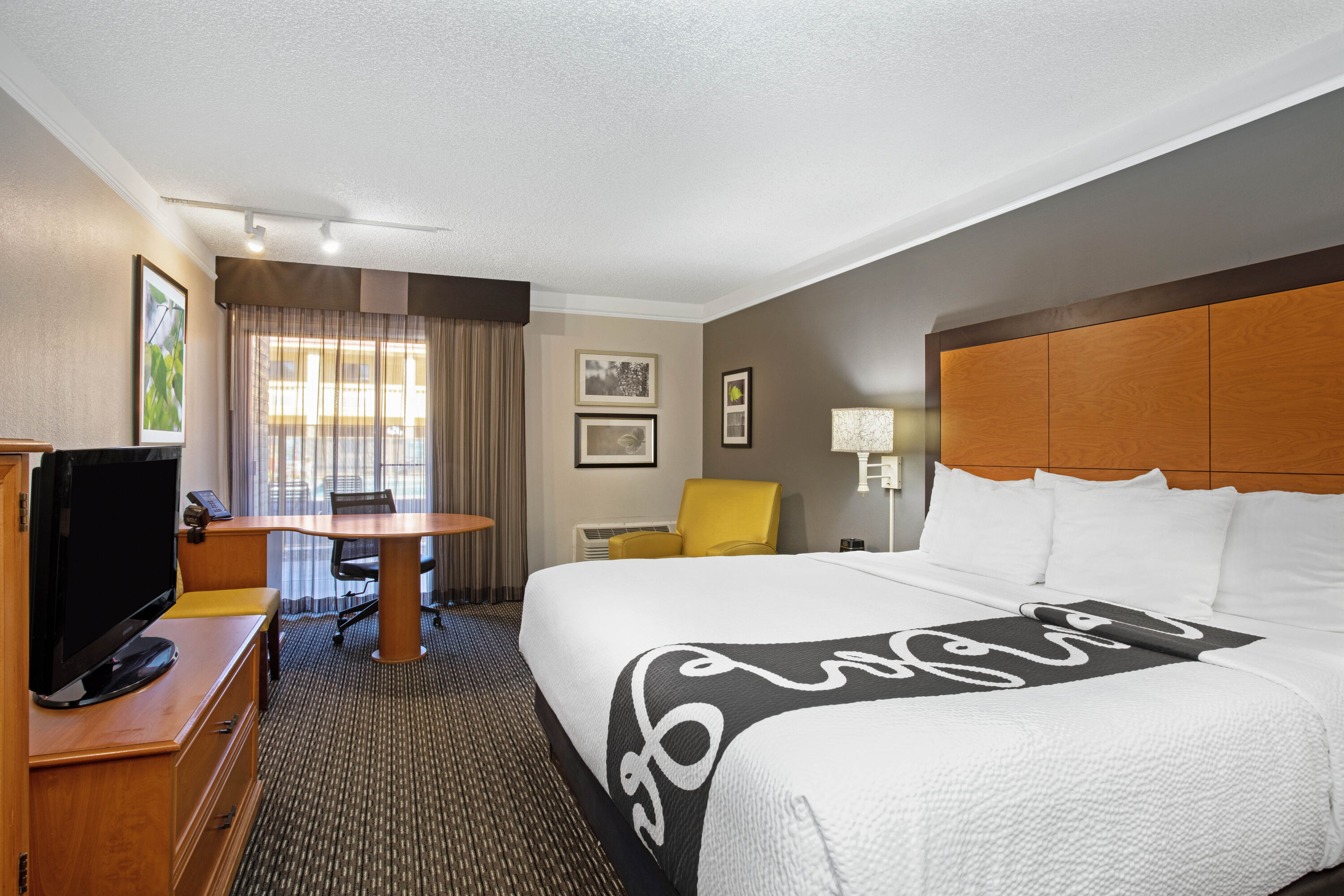 Guest room at the La Quinta Inn by Wyndham Tucson East in Tucson, Arizona