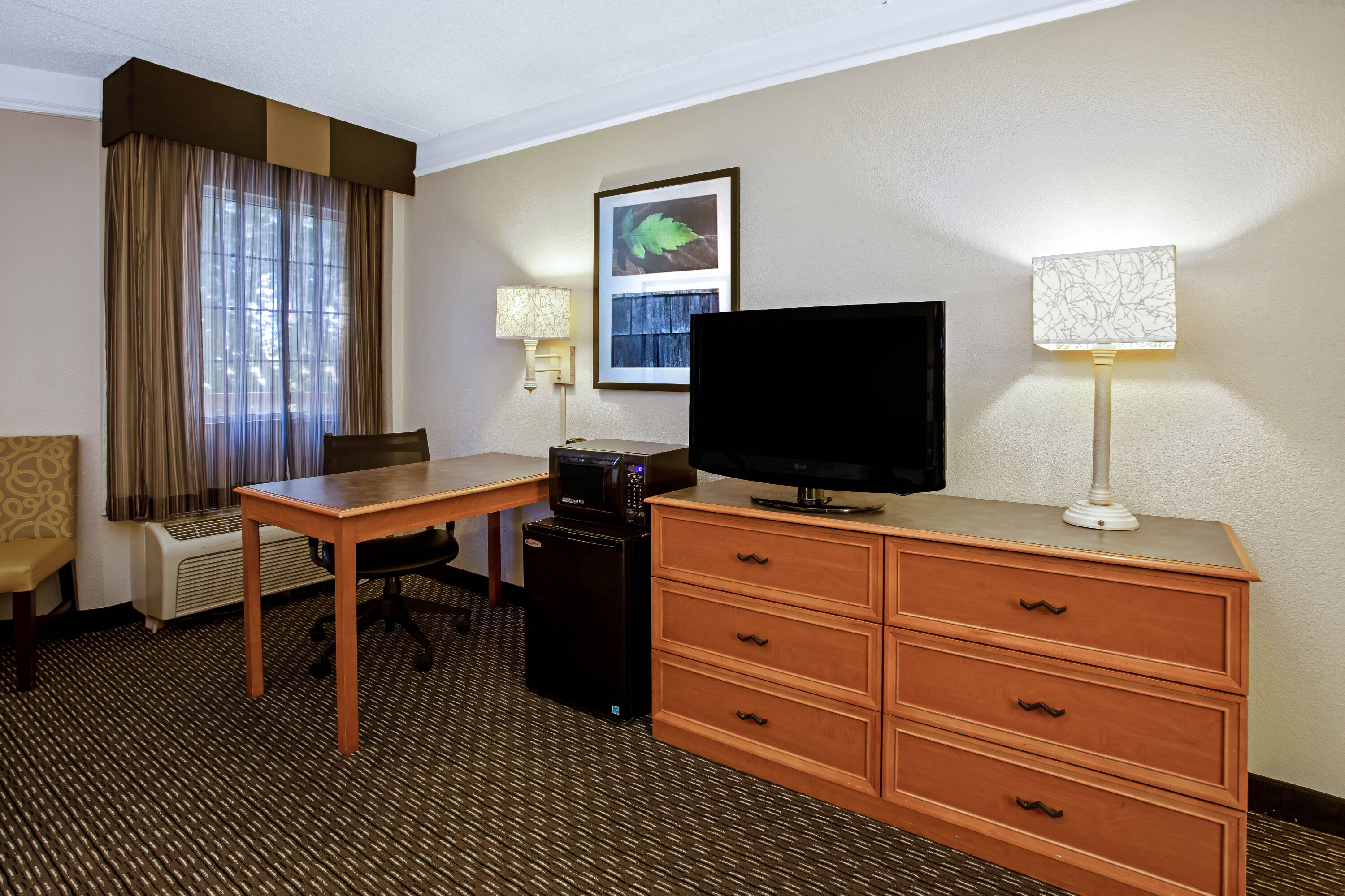 Guest room feature at the La Quinta Inn & Suites by Wyndham Tucson Airport in Tucson, Arizona