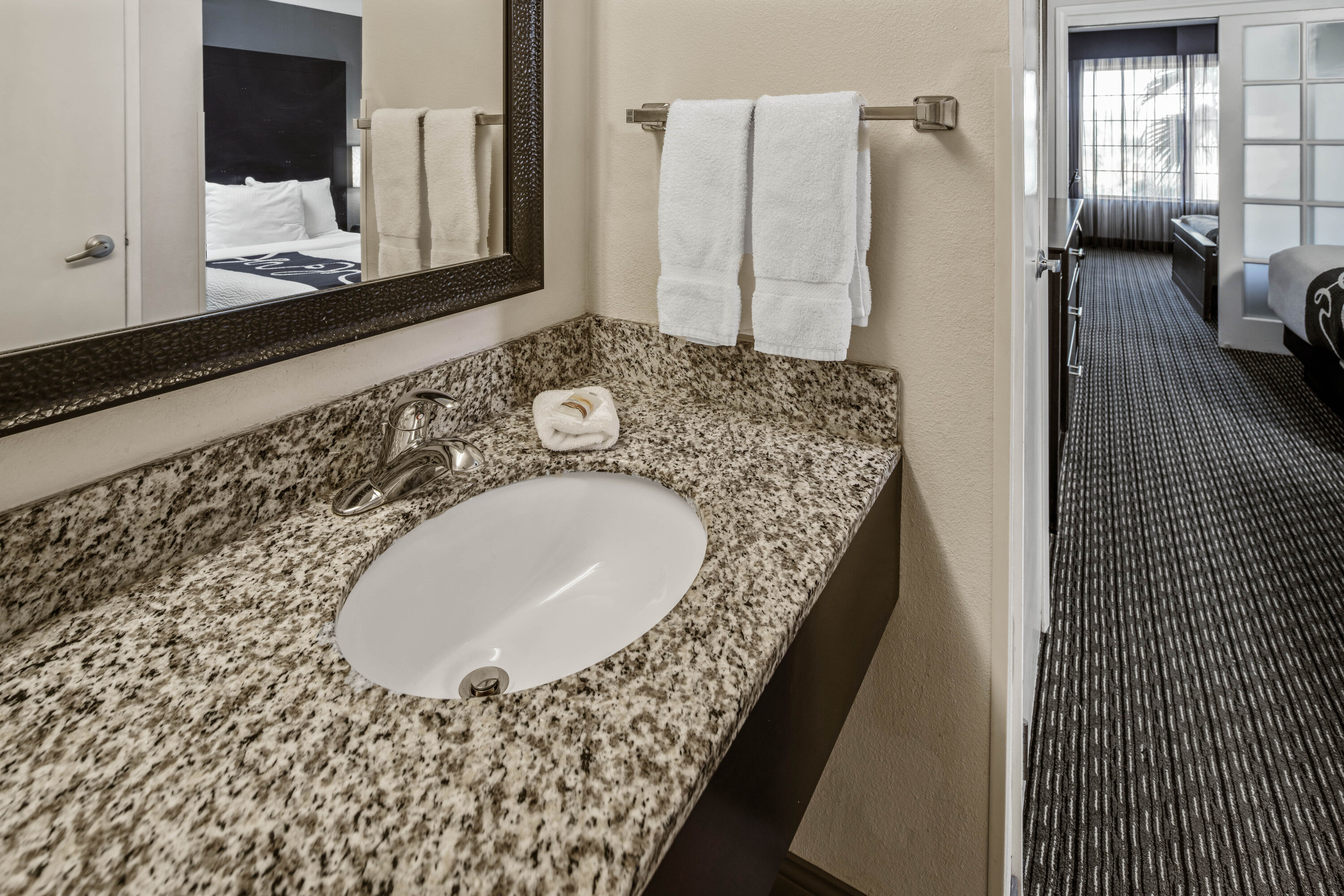 Guest room bath at the La Quinta Inn & Suites by Wyndham Anaheim in Anaheim, California