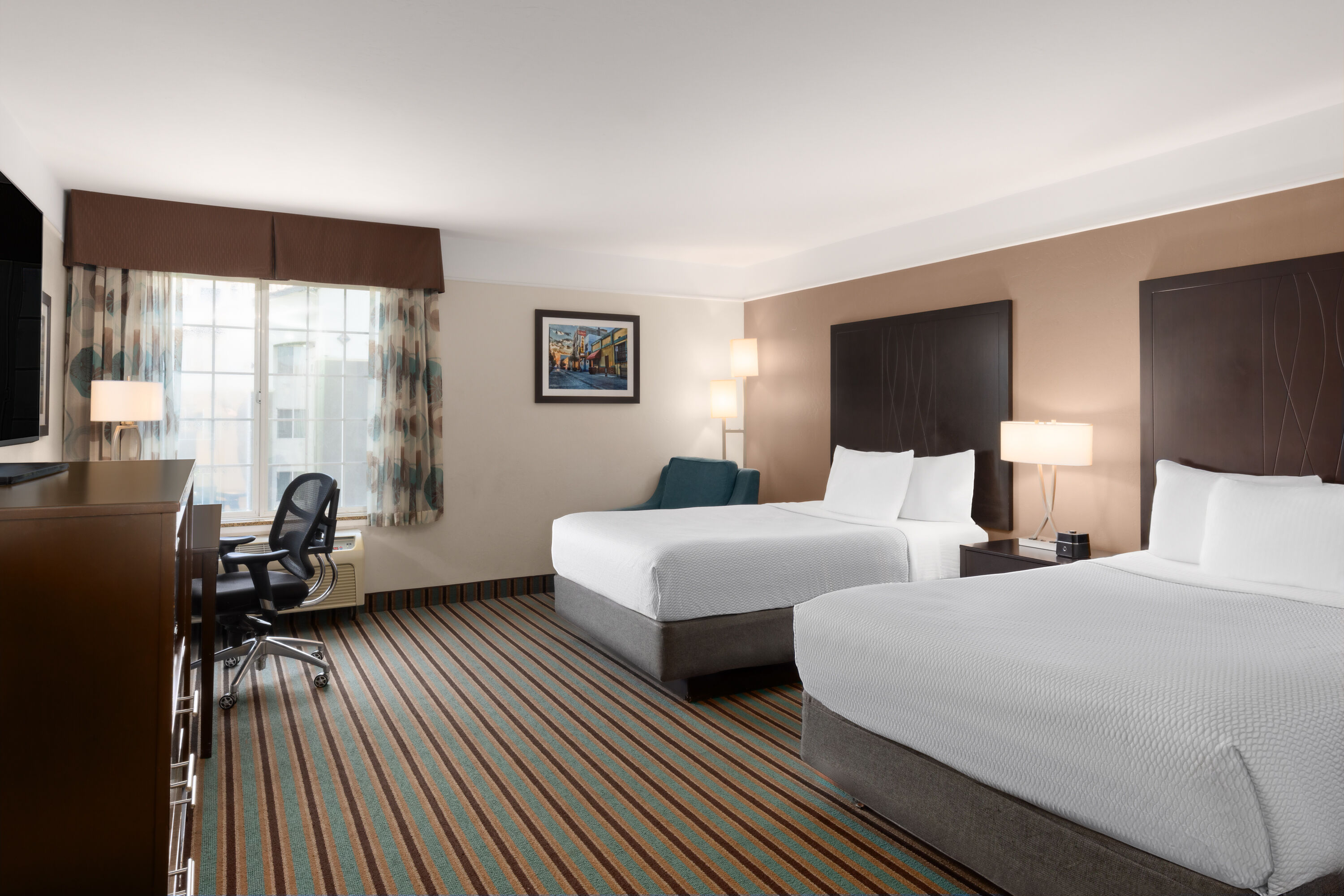 Guest room at the La Quinta Inn & Suites by Wyndham Bakersfield North in Bakersfield, California