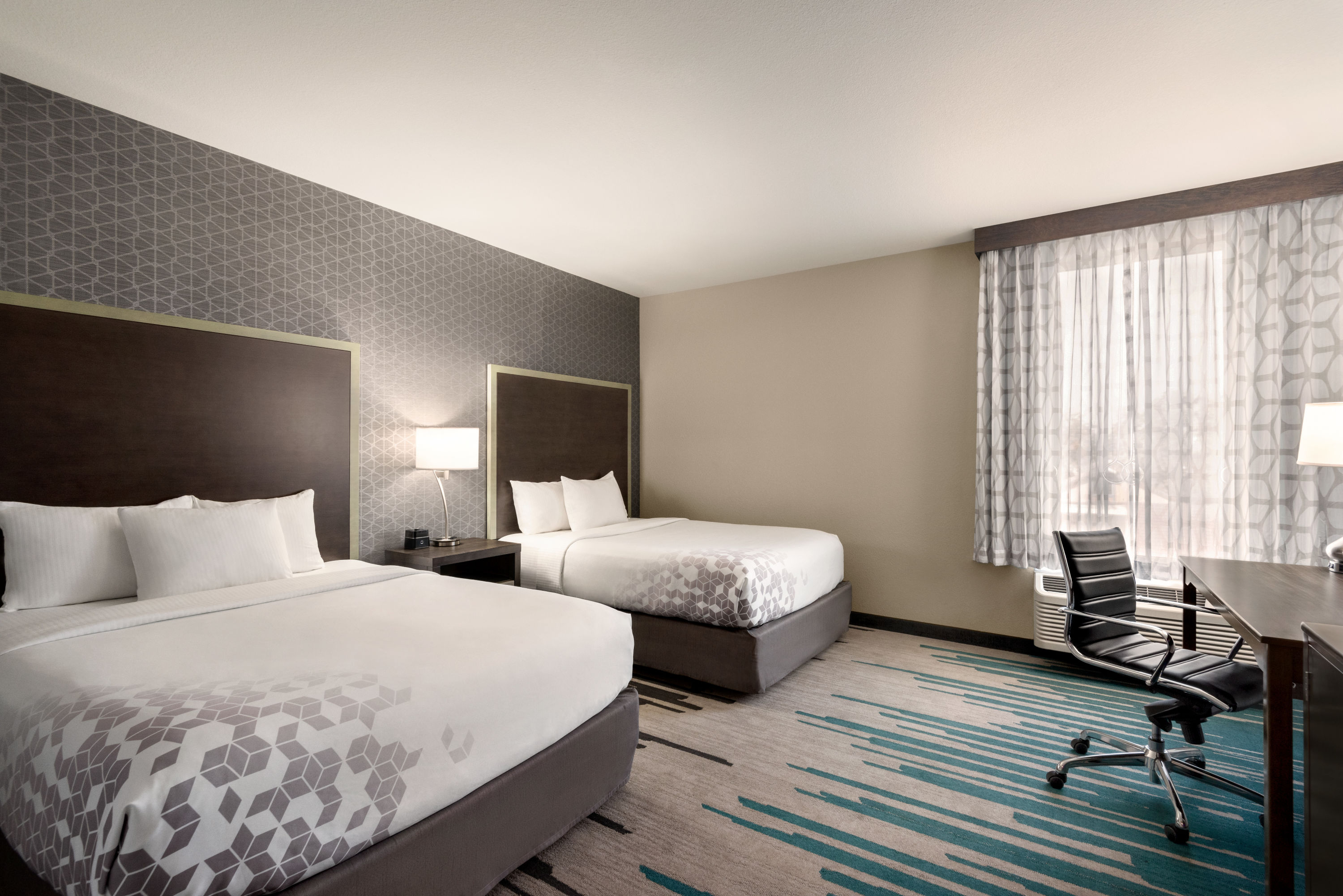 Guest room at the La Quinta Inn & Suites by Wyndham Clovis CA in Clovis, California