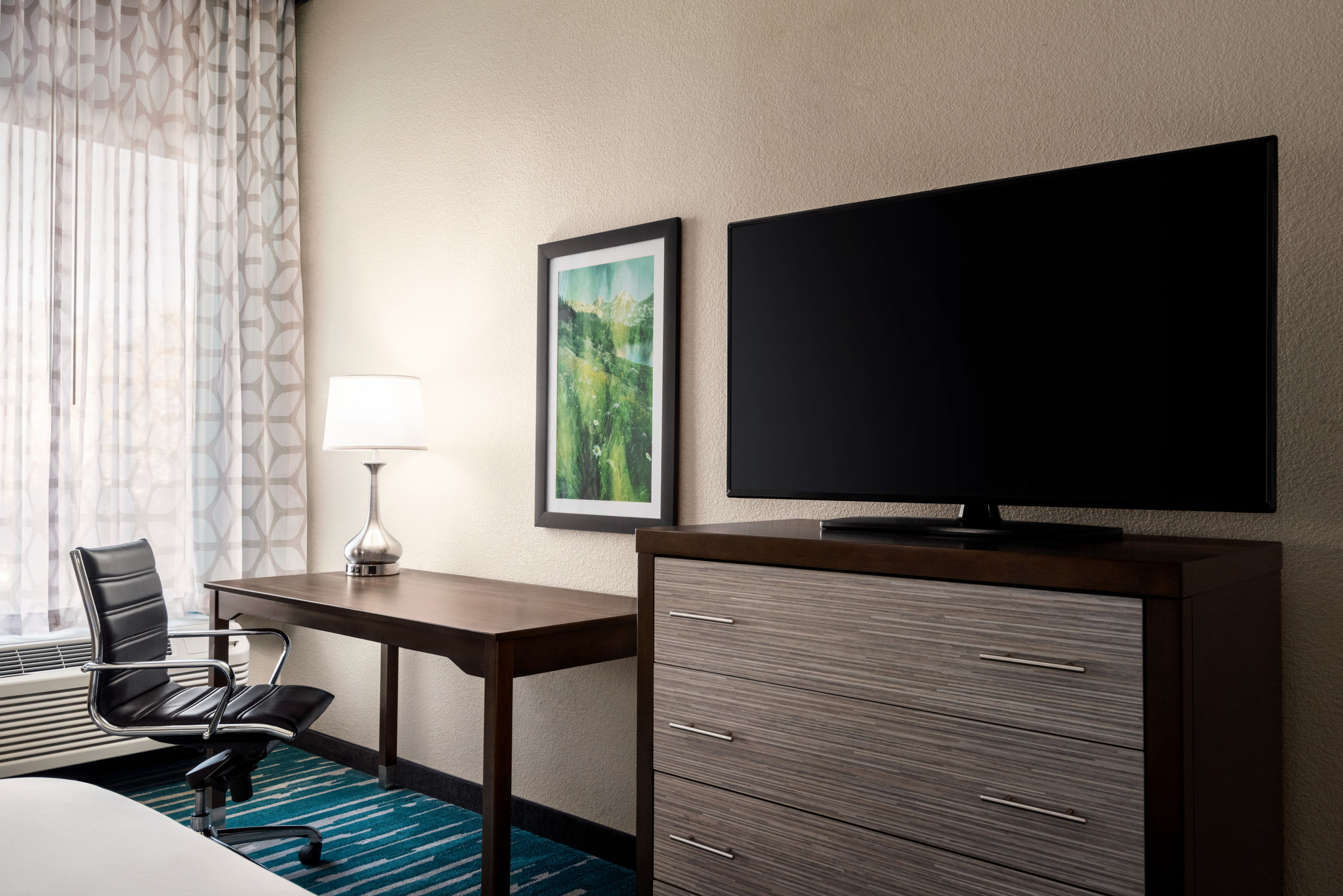 Guest room at the La Quinta Inn & Suites by Wyndham Clovis CA in Clovis, California