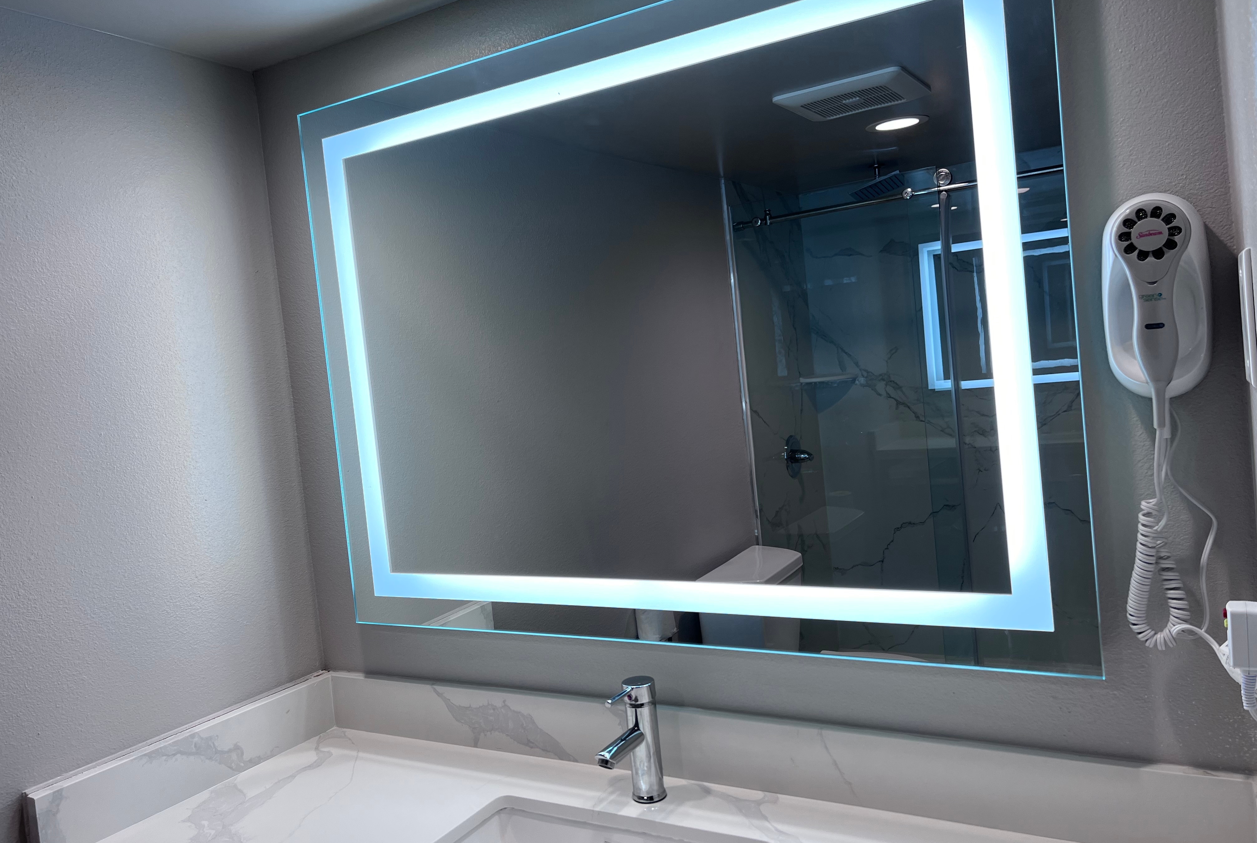 Guest room bath at the La Quinta Inn by Wyndham Costa Mesa / Newport Beach in Costa Mesa, California