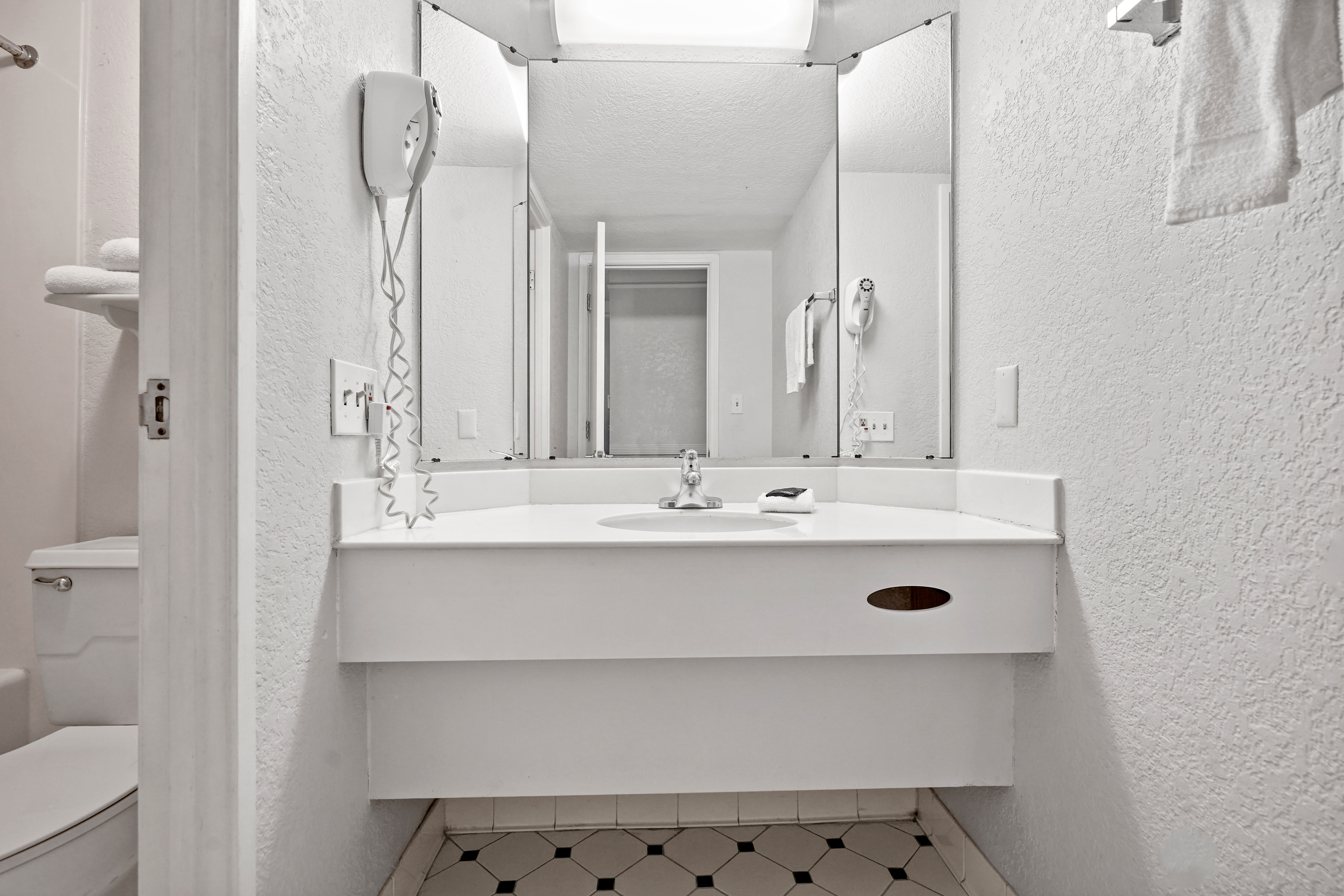 Guest room bath at the La Quinta Inn by Wyndham Costa Mesa / Newport Beach in Costa Mesa, California